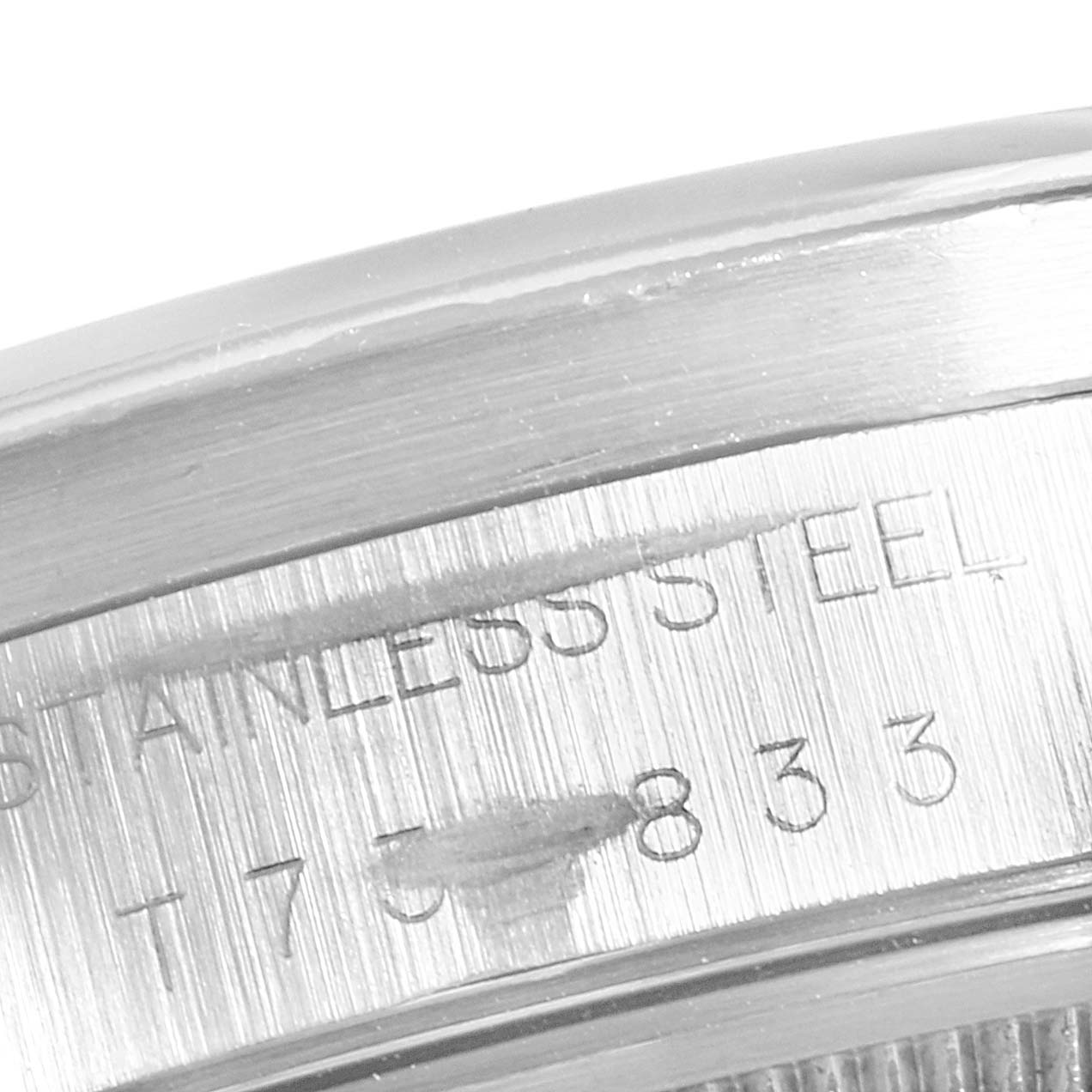 This close-up image shows the polished edge and engraved stainless steel details of a Rolex Air-King 14010 Men's Stainless Steel Black Dial 14010 Men's Stainless Steel Black Dial watch.