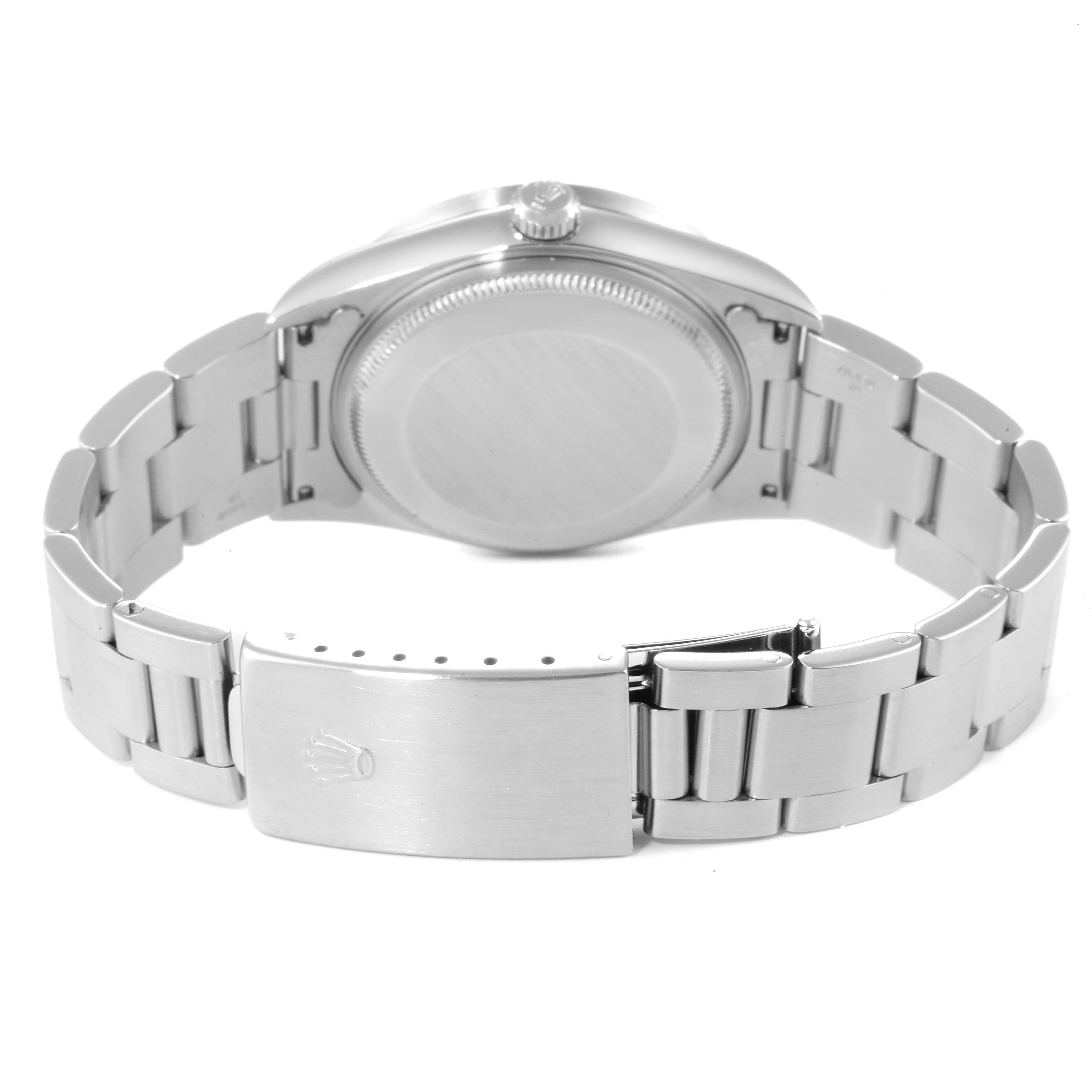 This image shows the back case and bracelet clasp of the Rolex Air-King 14010 Men's Stainless Steel Black Dial 14010 Men's Stainless Steel Black Dial watch at a rear angle.