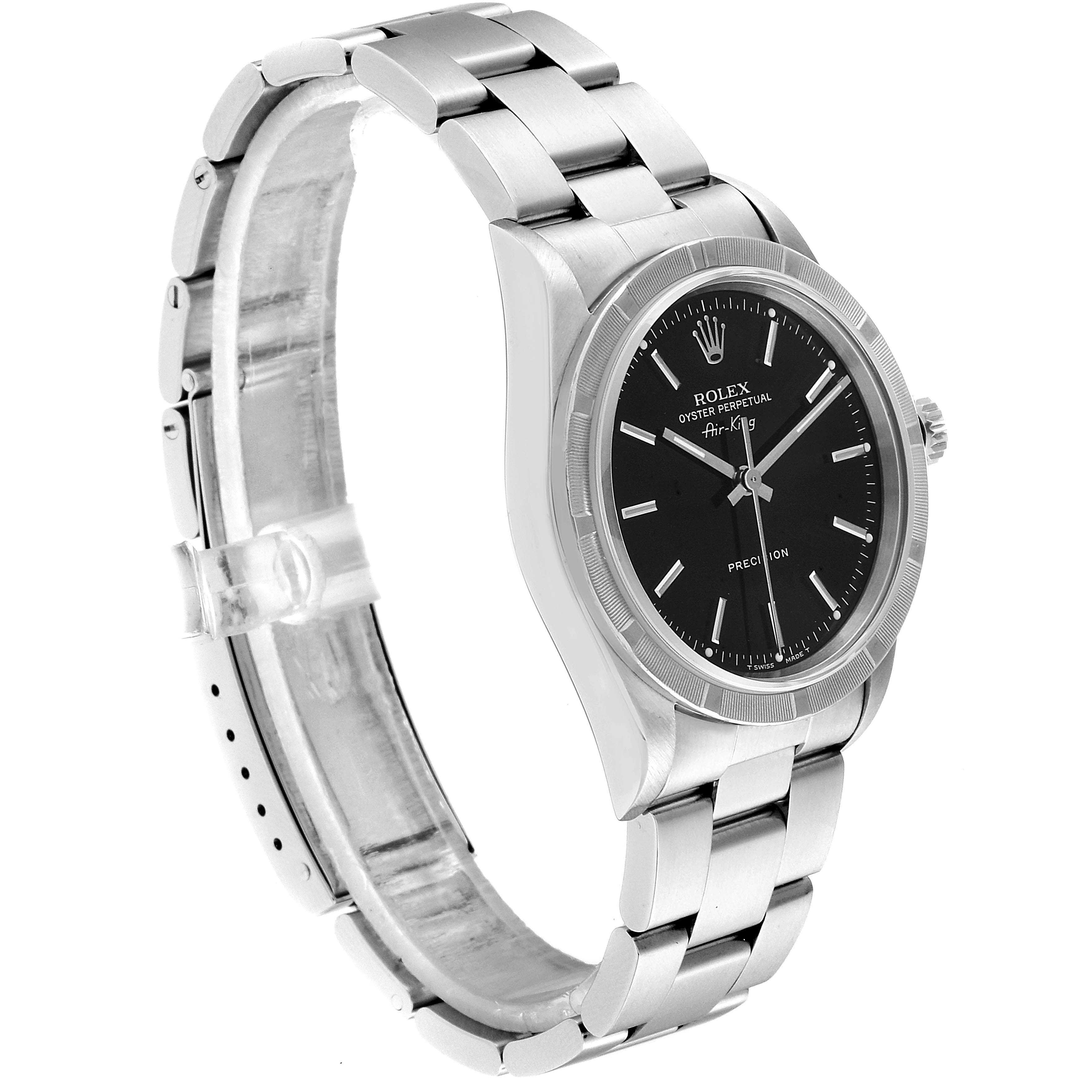 The Rolex Air-King 14010 Men's Stainless Steel Black Dial 14010 Men's Stainless Steel Black Dial watch is shown at an angled side view, showcasing its stainless steel case, black dial, and metal bracelet.