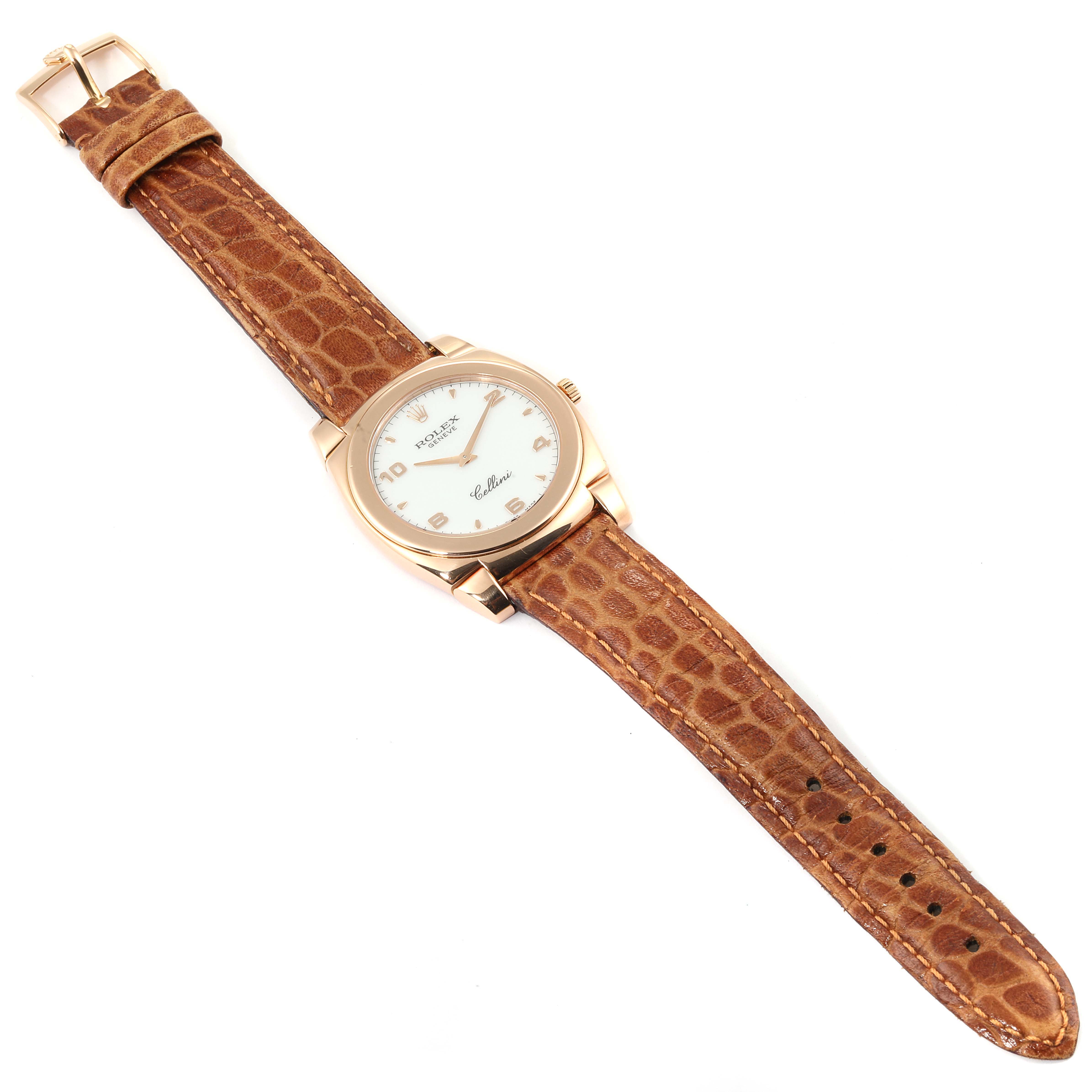 The image shows a Rolex Cellini 5330 Men's Rose Gold White Dial 5330 Men's Rose Gold White Dial watch from a top view, highlighting its face, case, and brown leather strap.