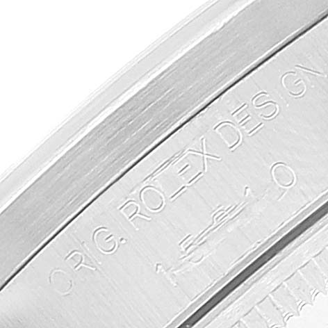This image shows a close-up of the case side engraving of a Rolex Date 15210 Men's Stainless Steel White Dial 15210 Men's Stainless Steel White Dial model watch.
