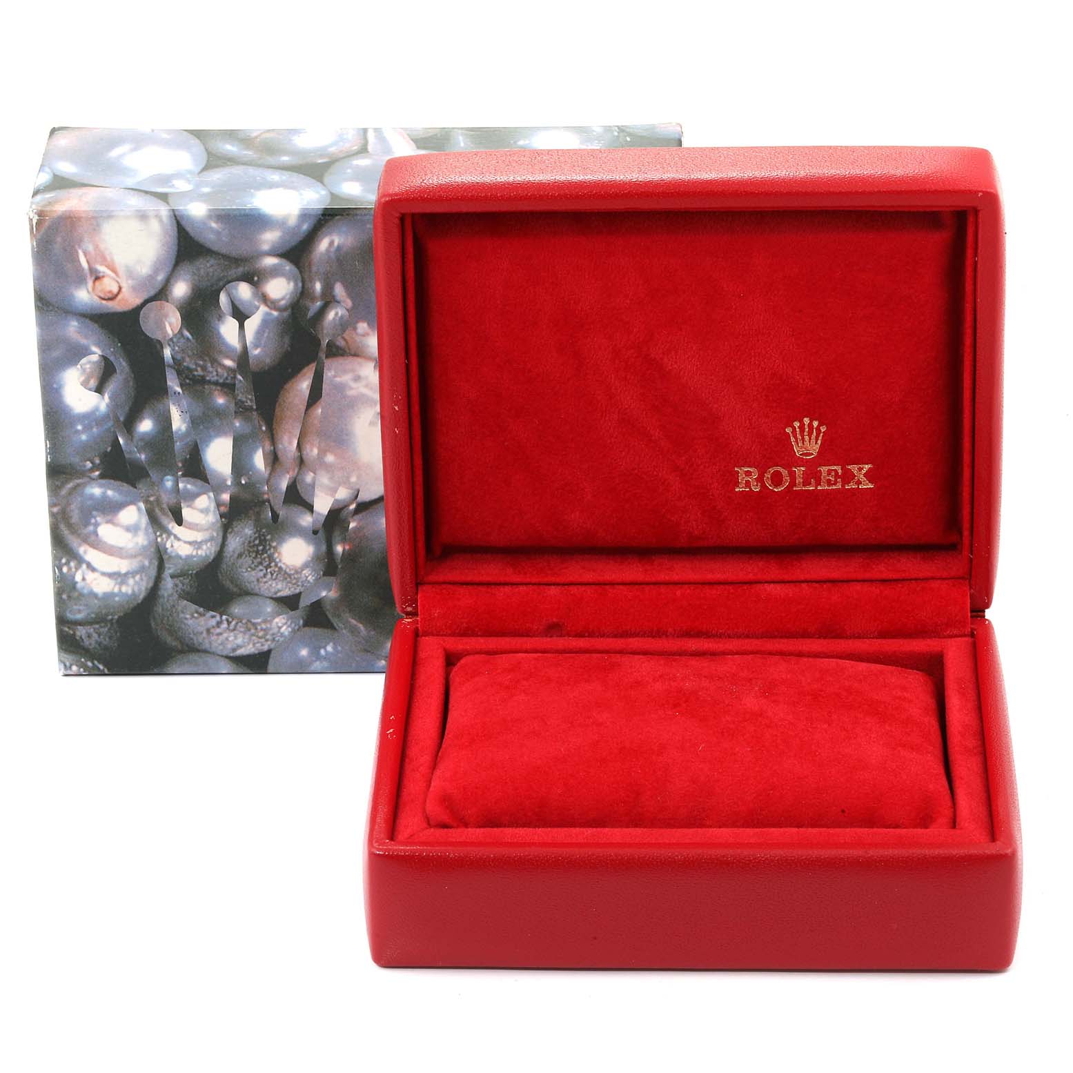 This image shows the red Rolex Datejust 69174 Women's Stainless Steel Pink Dial 69174 Women's Stainless Steel Pink Dial watch box, open, with an empty pillow inside, and the outer decorative box.