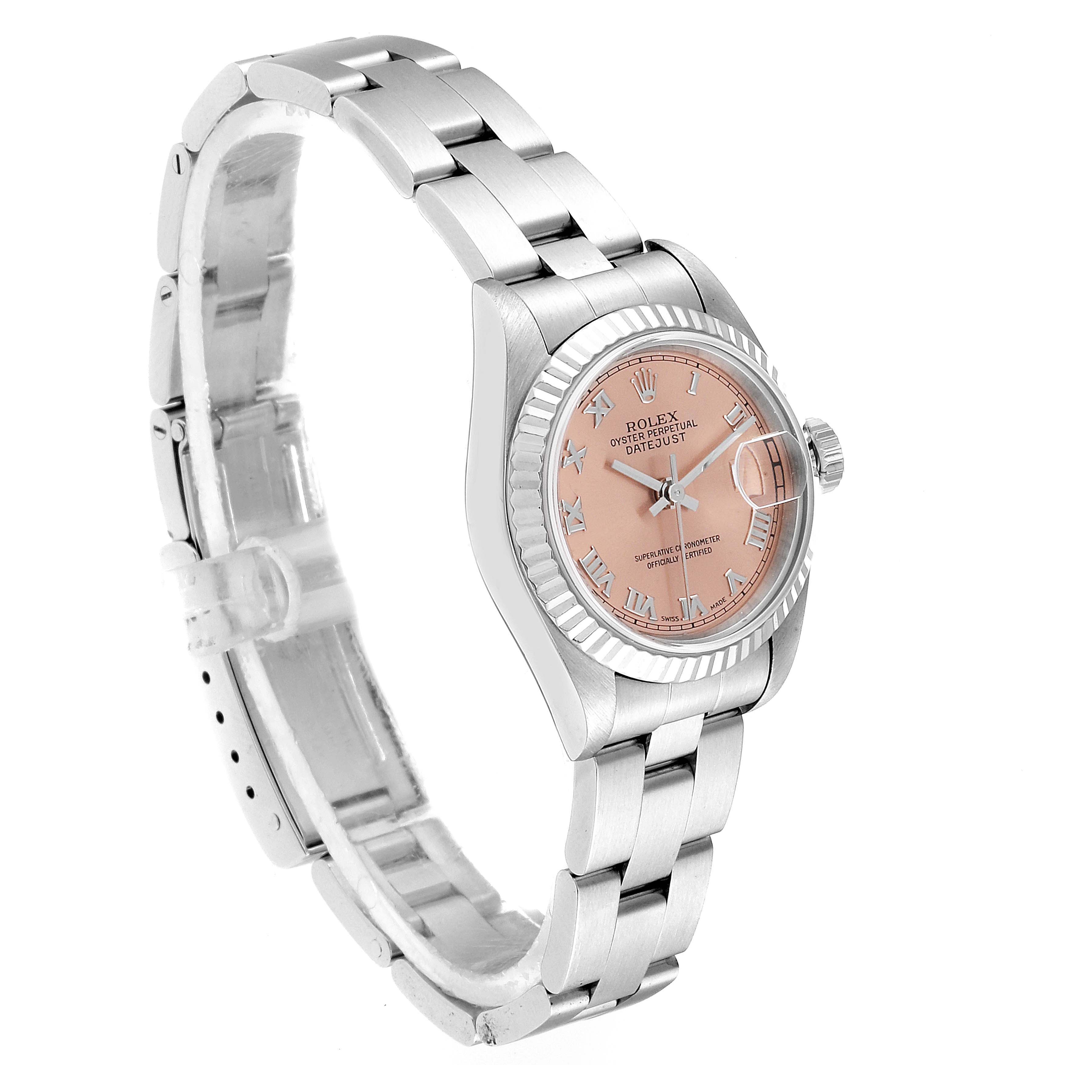 This is a Rolex Datejust 69174 Women's Stainless Steel Pink Dial 69174 Women's Stainless Steel Pink Dial watch shown at a three-quarter angle, highlighting its bracelet, case, bezel, and dial.