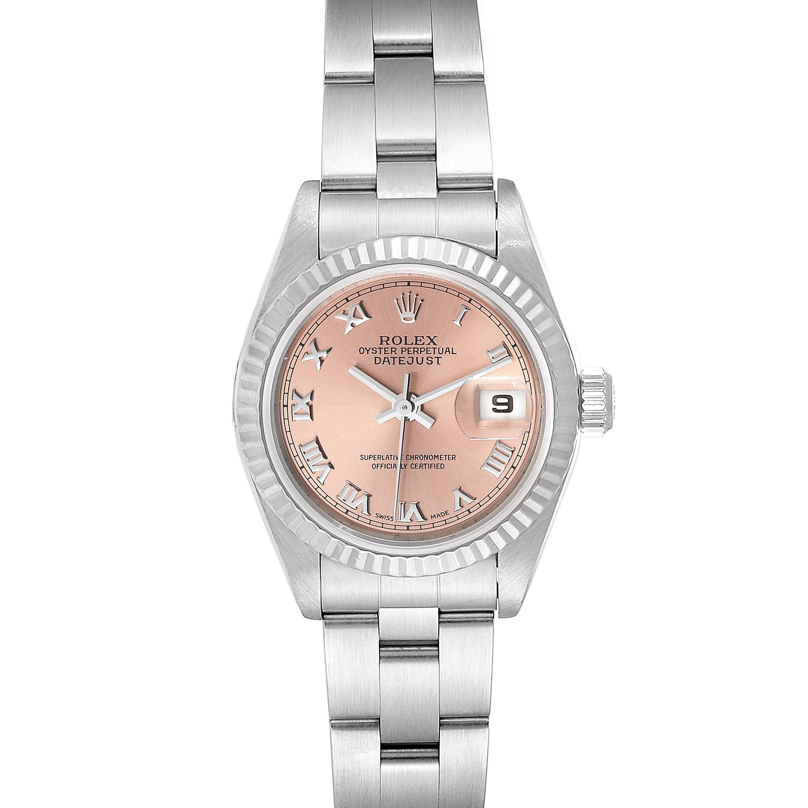 The image shows a Rolex Datejust 69174 Women's Stainless Steel Pink Dial 69174 Women's Stainless Steel Pink Dial watch from a top-down angle, highlighting the dial, hands, bracelet, and date window.