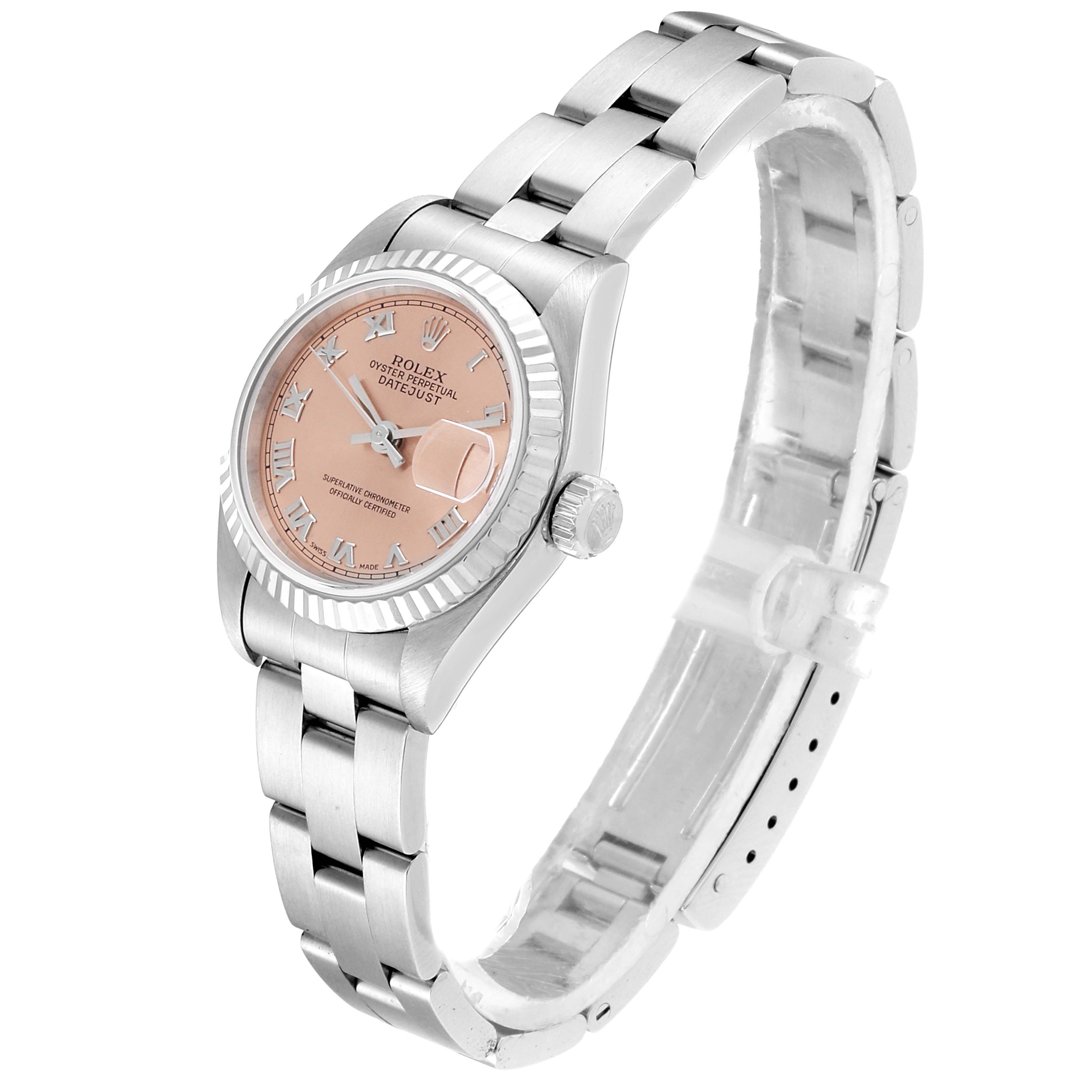 The Rolex Datejust 69174 Women's Stainless Steel Pink Dial 69174 Women's Stainless Steel Pink Dial watch is shown at a three-quarter angle, displaying the face, bezel, crown, and bracelet.