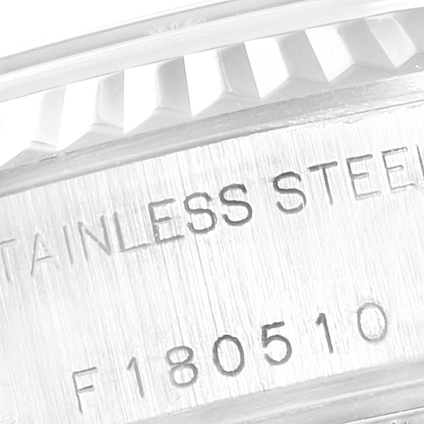 This close-up image shows a portion of the model number and the stainless steel material of a Rolex Datejust 79174 Women's Stainless Steel Pink Dial 79174 Women's Stainless Steel Pink Dial watch.