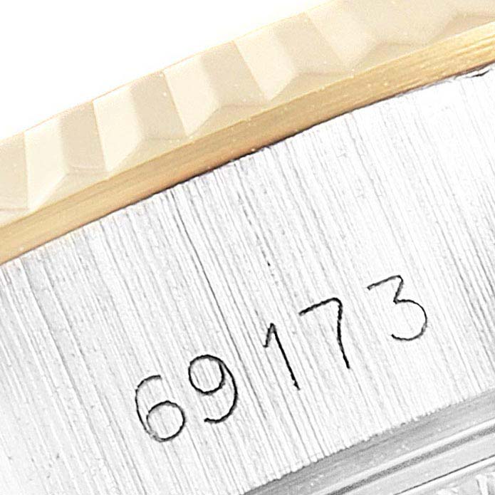 Close-up view of the casing and serial number (69173) on a Rolex Datejust 69173 Women
s Steel and Gold (two tone) Champagne Dial 69173 Women
s Steel and Gold (two tone) Champagne Dial watch.