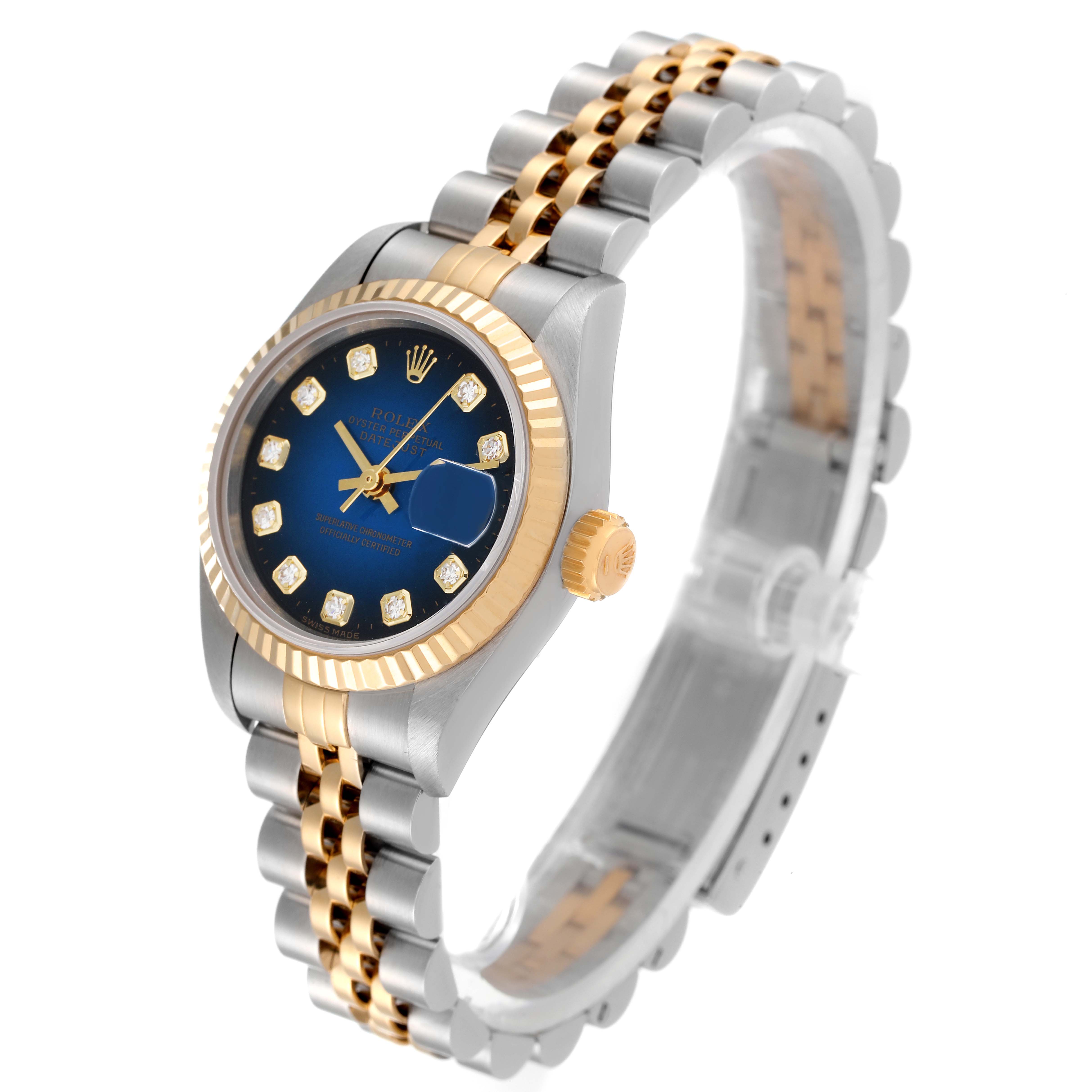The Rolex Datejust 69173 Women's Steel and Gold (two tone) Blue Dial 69173 Women's Steel and Gold (two tone) Blue Dial watch is shown at an angle highlighting its blue dial, two-tone bracelet, crown, and fluted bezel.