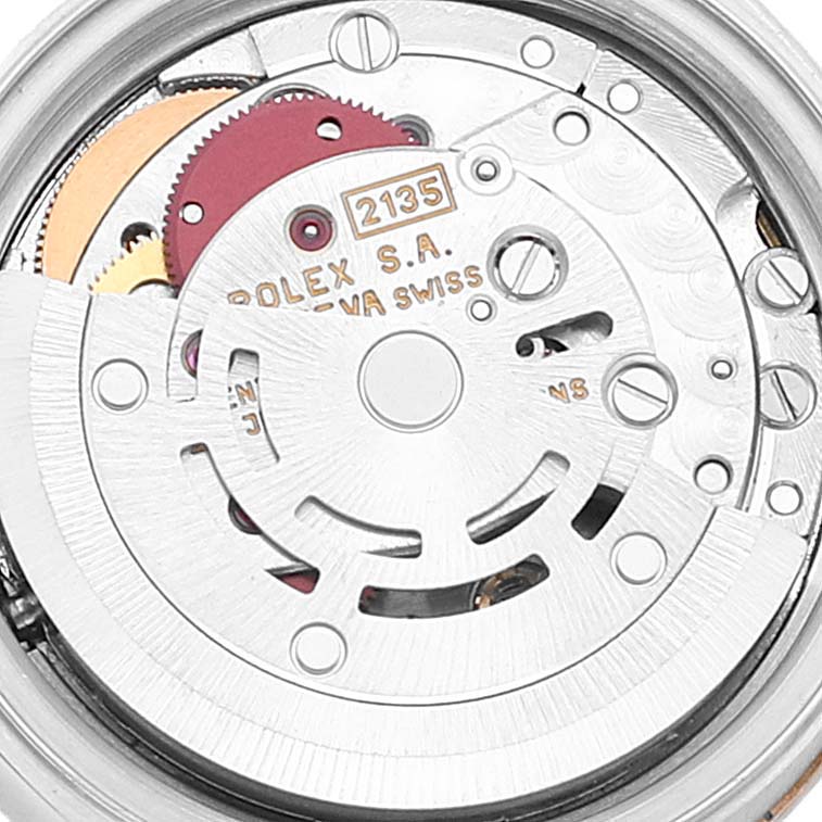 The image shows a close-up of the movement mechanism of a Rolex Datejust 69173 Women
s Steel and Gold (two tone) Champagne Dial 69173 Women
s Steel and Gold (two tone) Champagne Dial watch.