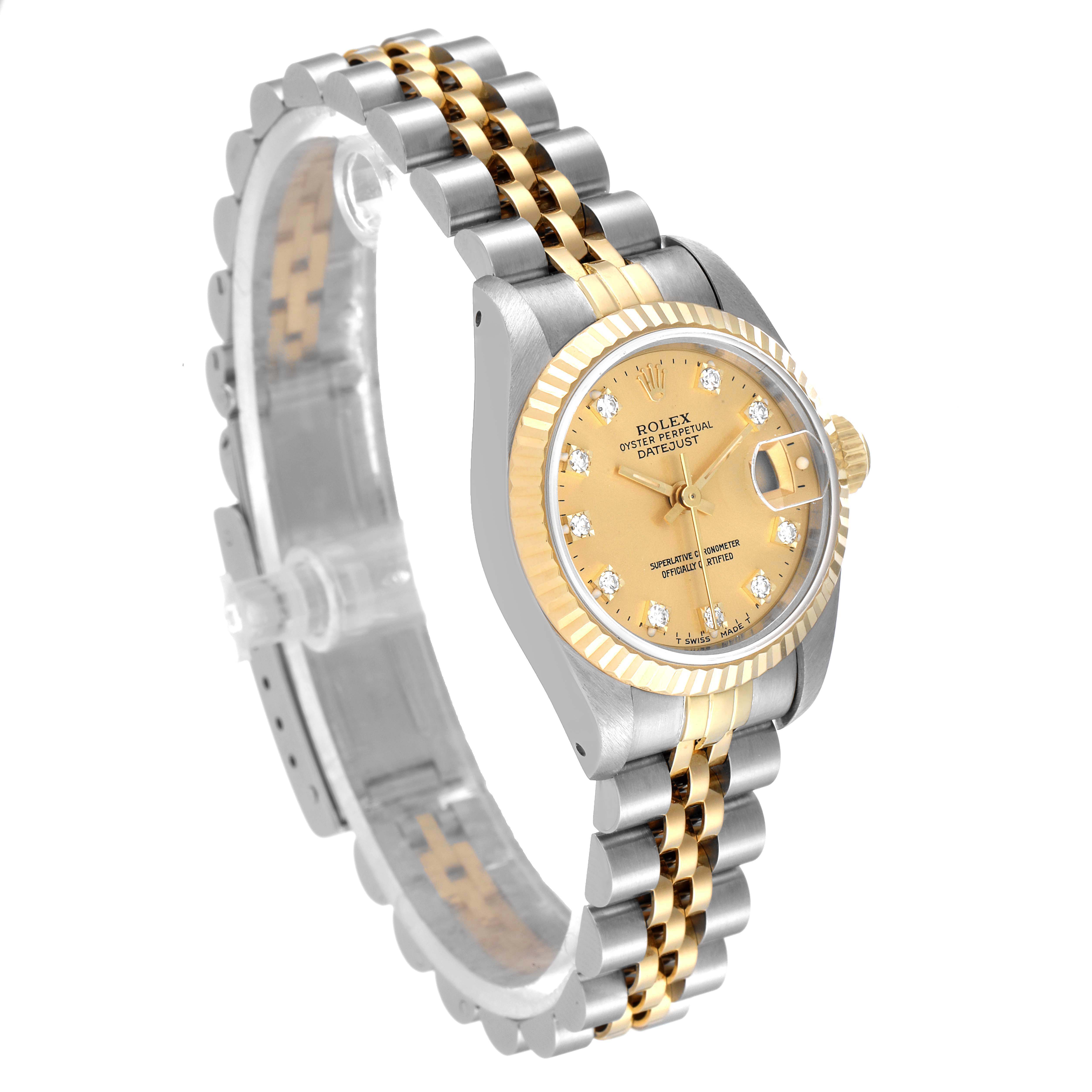 The Rolex Datejust 69173 Women
s Steel and Gold (two tone) Champagne Dial 69173 Women
s Steel and Gold (two tone) Champagne Dial watch is shown at a three-quarter angle, featuring its dial, fluted bezel, and Jubilee bracelet.