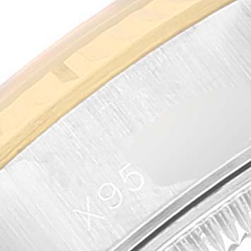 This image shows a close-up of the bezel and part of the case for a Rolex Datejust 69173 Women
s Steel and Gold (two tone) Champagne Dial 69173 Women
s Steel and Gold (two tone) Champagne Dial watch.