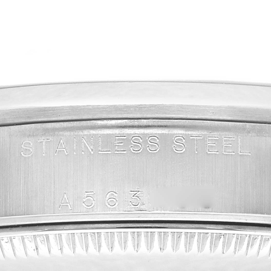 The image shows a close-up of the side of a Rolex Mid-Size 78240 Women
s Stainless Steel Black Dial 78240 Women
s Stainless Steel Black Dial watch featuring the "STAINLESS STEEL" and part of the model number.