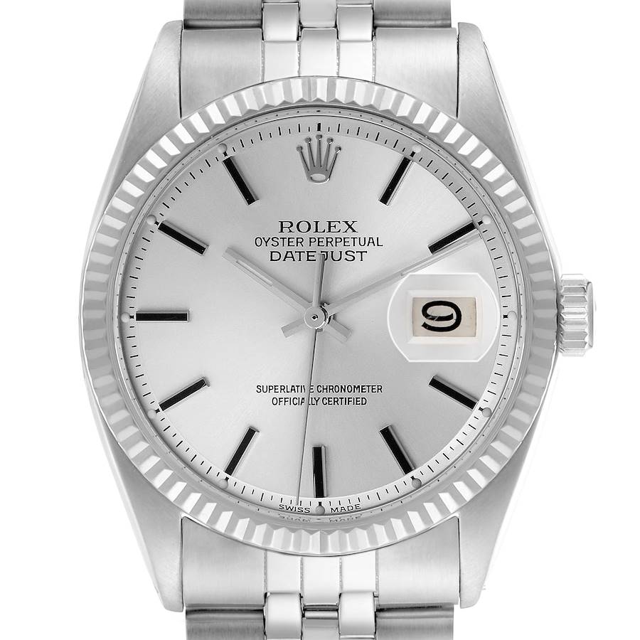 The Rolex Datejust watch is shown from a front angle, displaying the dial, bezel, crown, and part of the bracelet.
