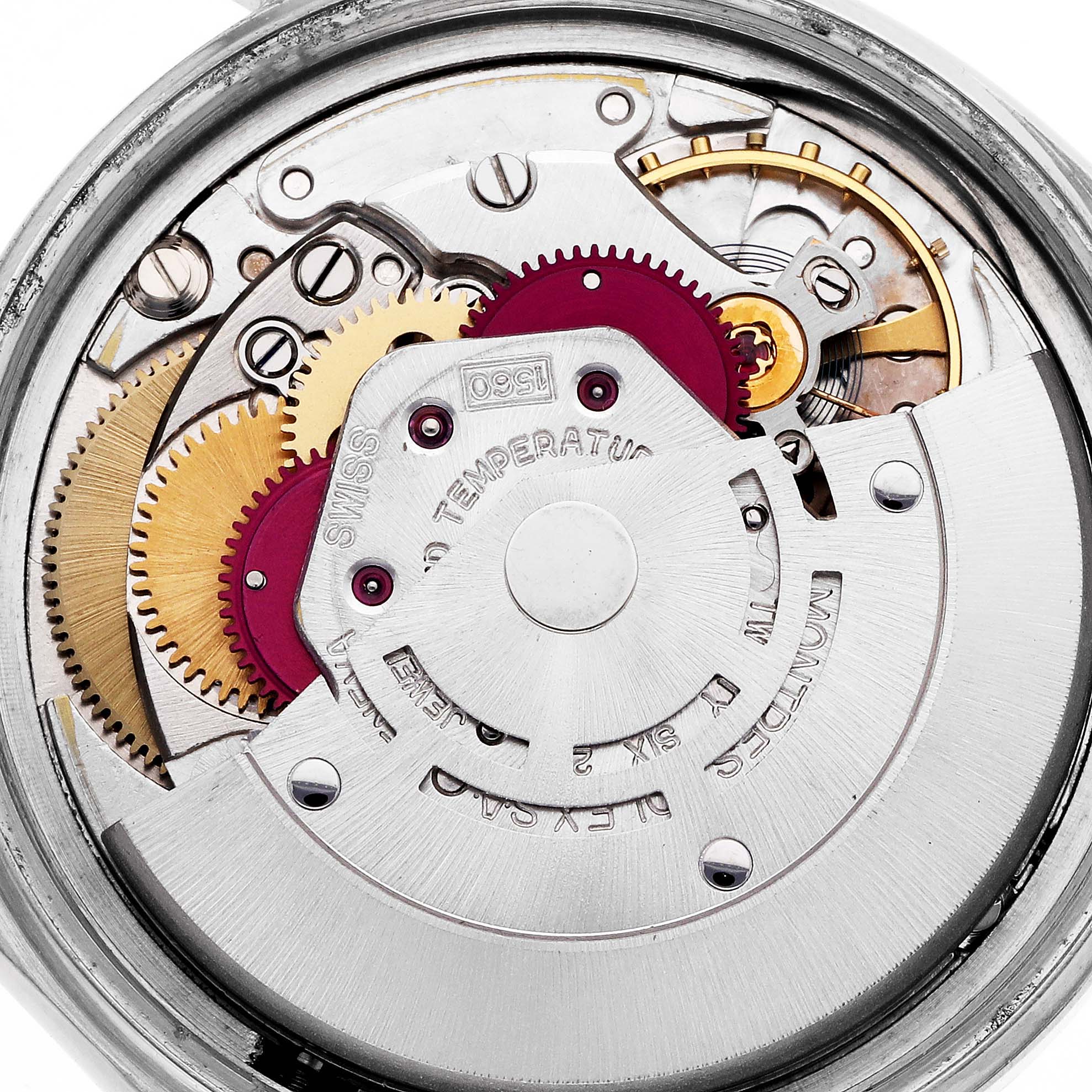 The image shows a close-up of the movement mechanism of a Rolex Datejust 1601 Men
s Stainless Steel Silver Dial 1601 Men
s Stainless Steel Silver Dial watch, highlighting gears and components.