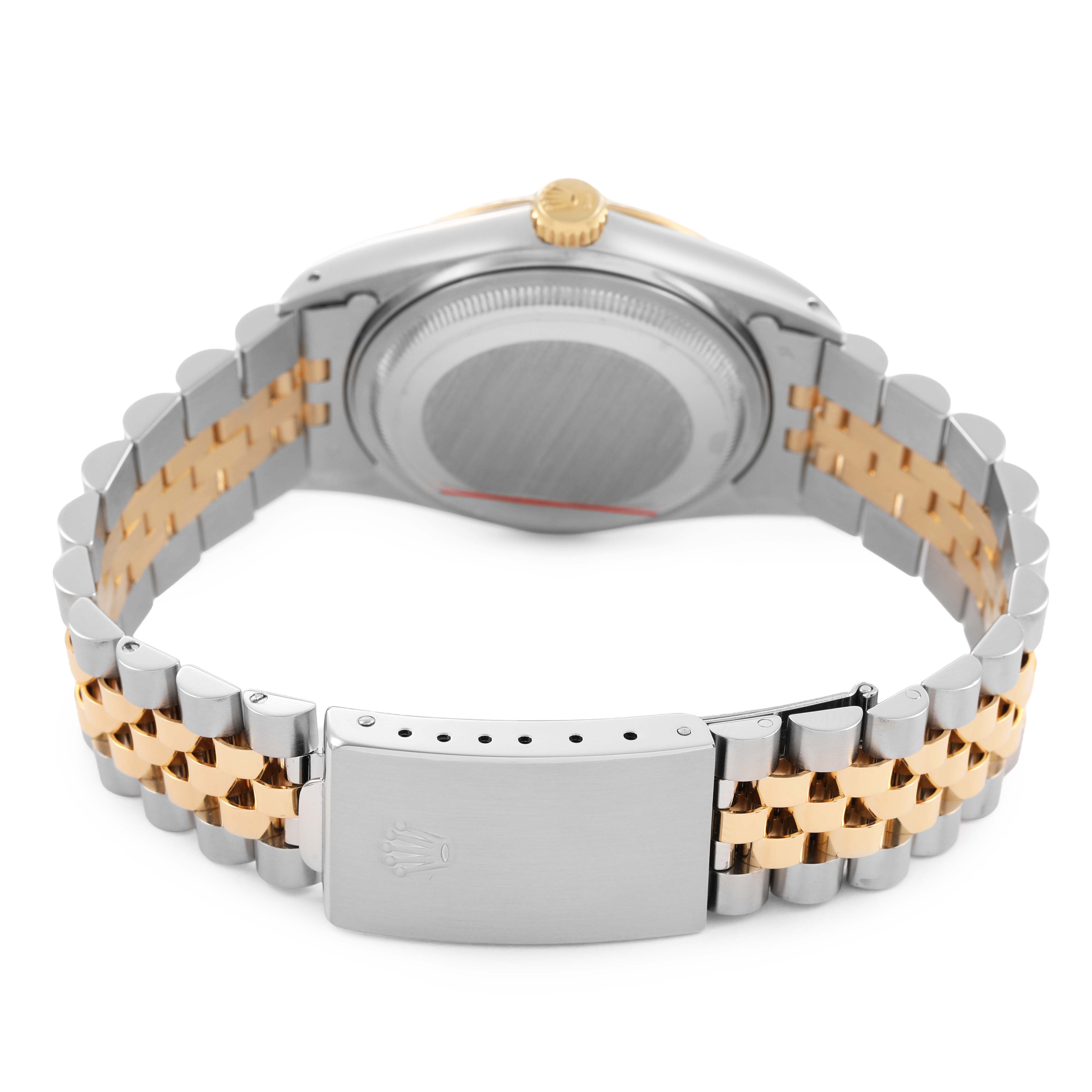The image shows the back view of a Rolex Datejust 16013 Men's Steel and Gold (two tone) Champagne Dial, highlighting its two-tone bracelet and clasp.