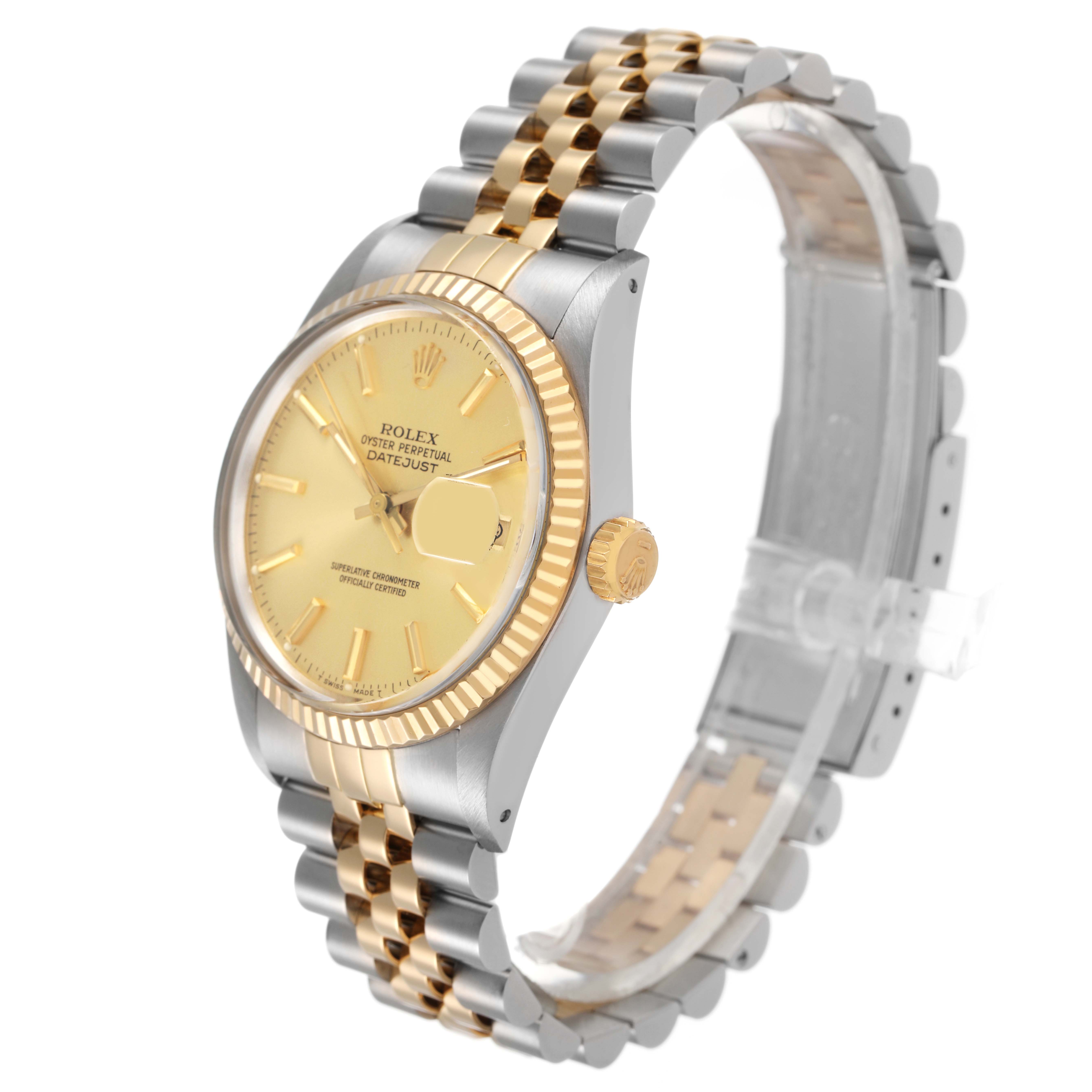 The Rolex Datejust 16013 Men's Steel and Gold (two tone) Champagne Dial watch is shown at a three-quarter angle, highlighting its face, fluted bezel, and two-tone Jubilee bracelet.