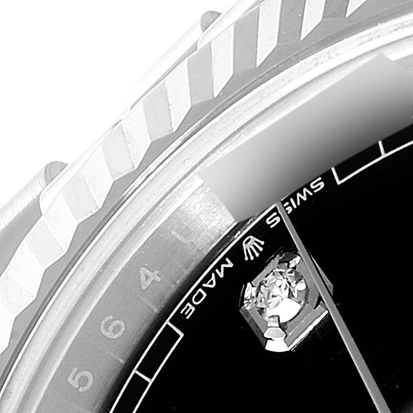 The image shows a close-up view of the bezel, part of the dial, and the "Swiss Made" text of a Rolex Datejust 41 126334 Men
s Stainless Steel Black Dial 126334 Men
s Stainless Steel Black Dial watch.