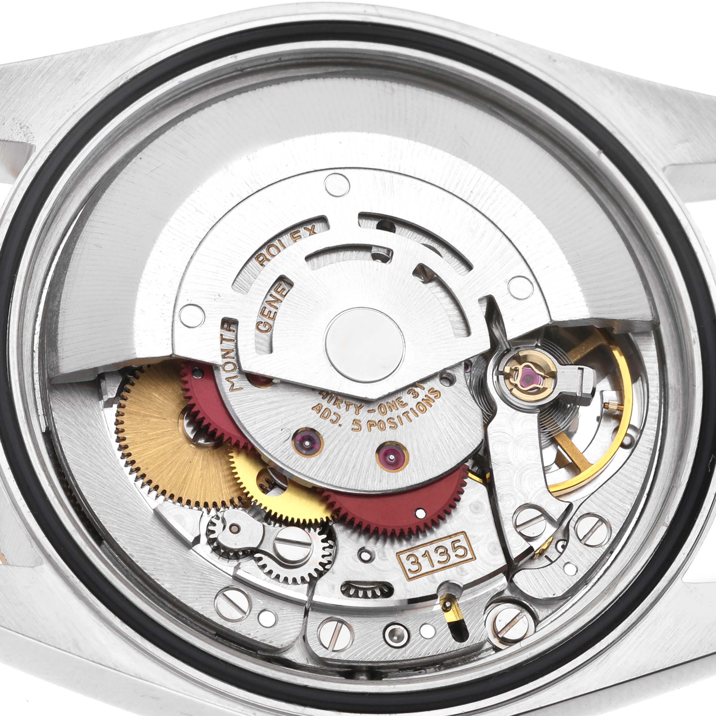This image shows the internal mechanism and movement of a Rolex Datejust 16233 Men's Steel and Gold (two tone) Champagne Dial 16233 Men's Steel and Gold (two tone) Champagne Dial watch at a close-up angle.