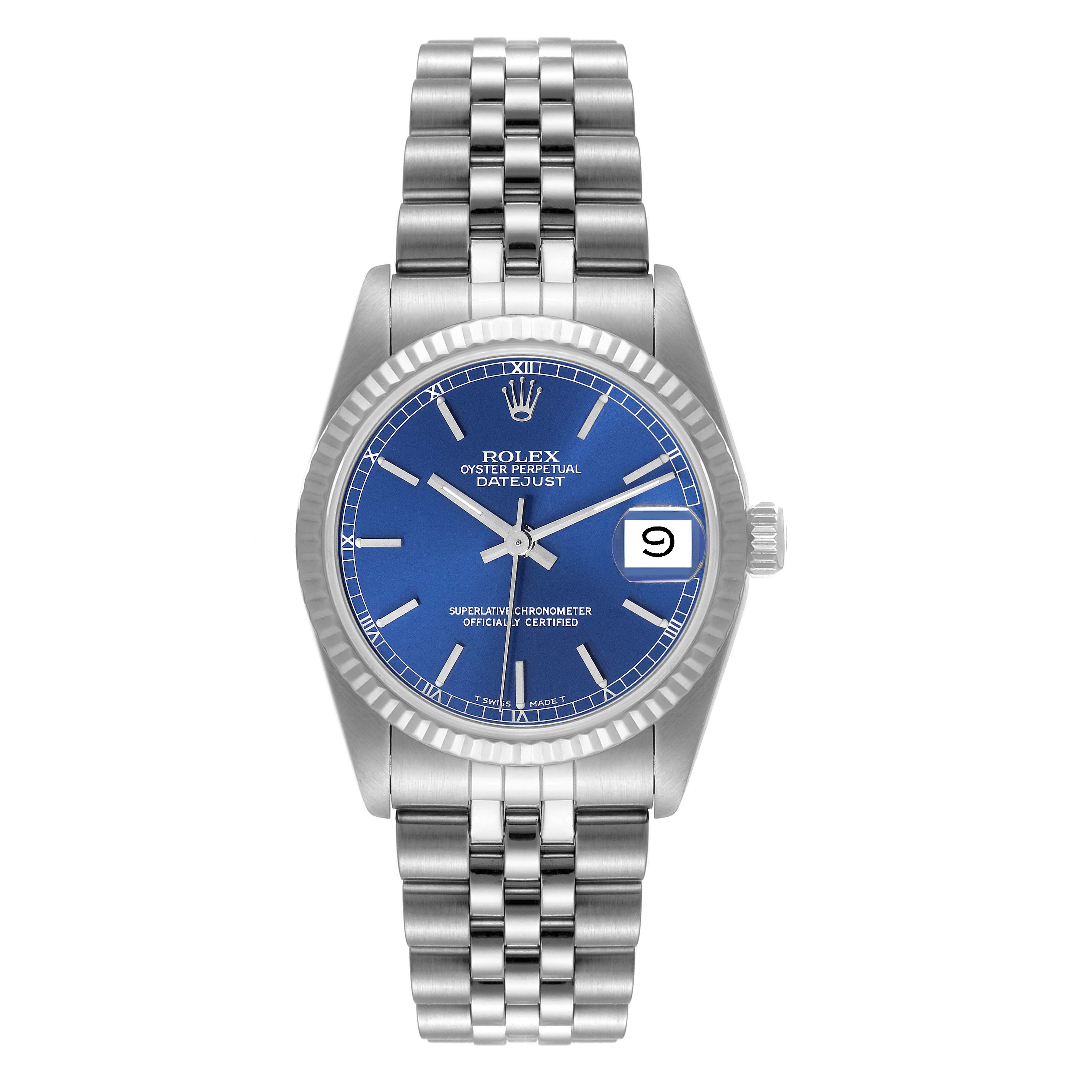 The image shows a front view of a Rolex Datejust Mid-Size watch with a blue dial and stainless steel bracelet.