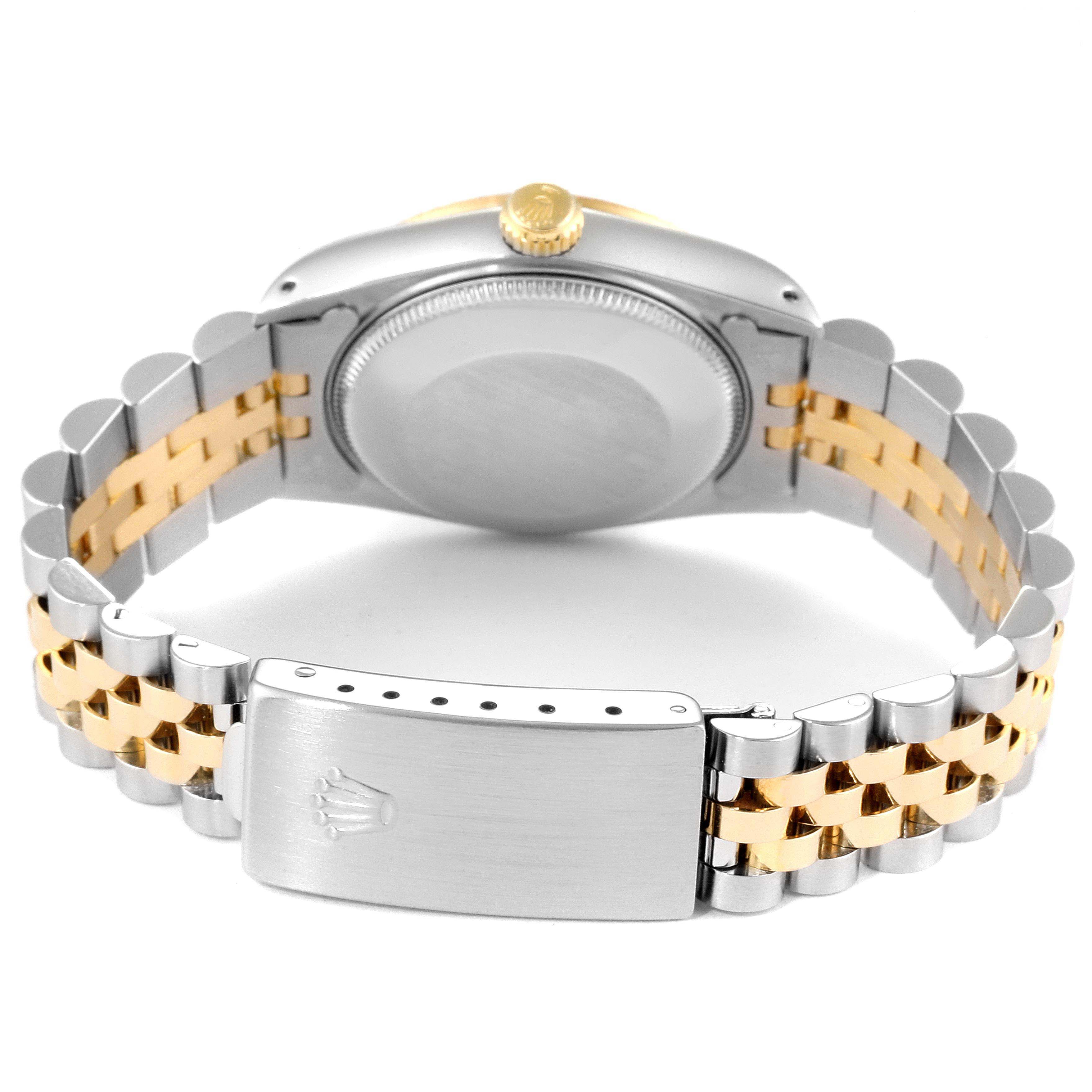 This image shows the back case and two-tone bracelet of the Rolex Mid-Size 68273 Women
s Steel and Gold (two tone) Champagne Dial 68273 Women
s Steel and Gold (two tone) Champagne Dial model watch.