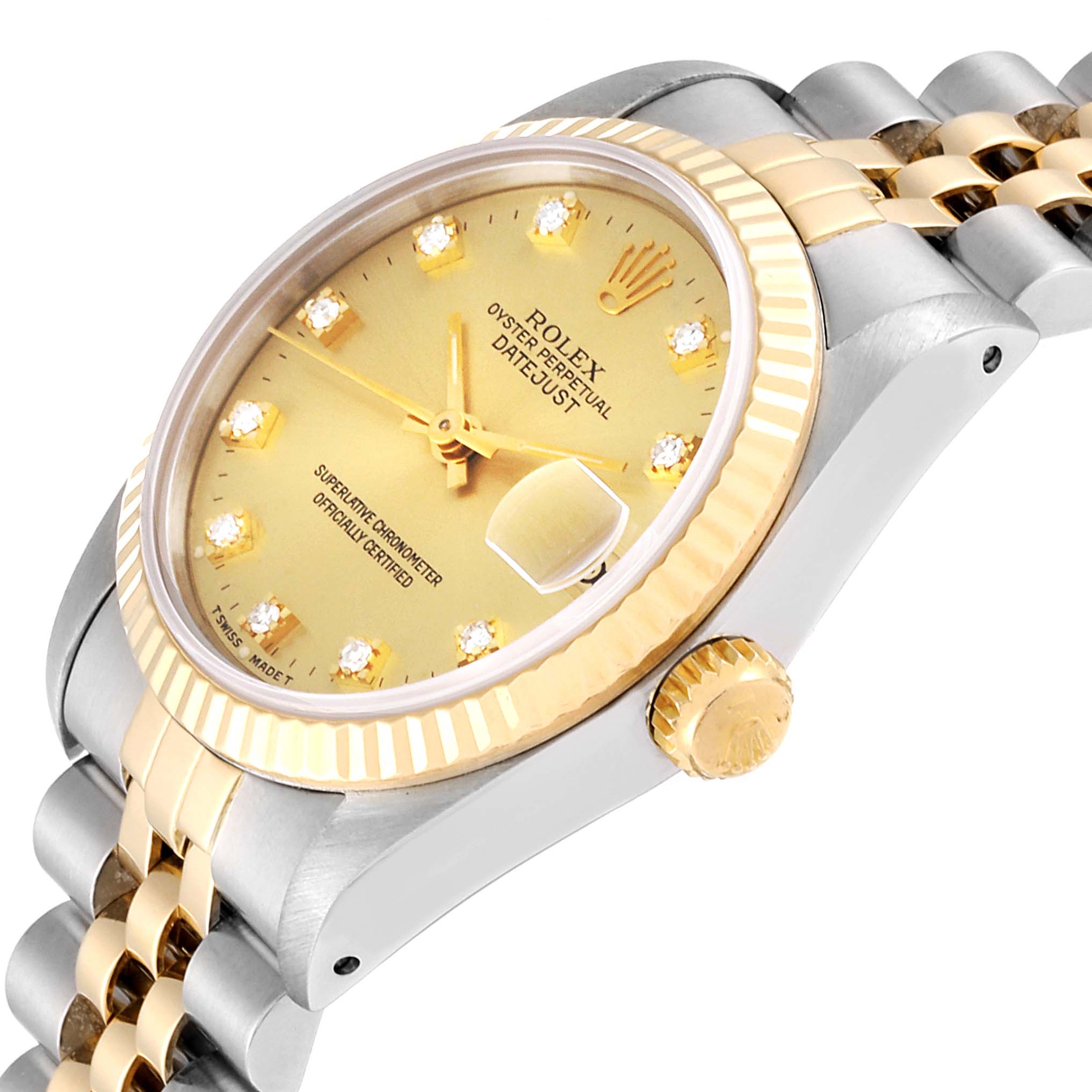 This image shows a Mid-Size Rolex Datejust watch from an angled side view, highlighting the dial, fluted bezel, crown, and part of the bracelet.