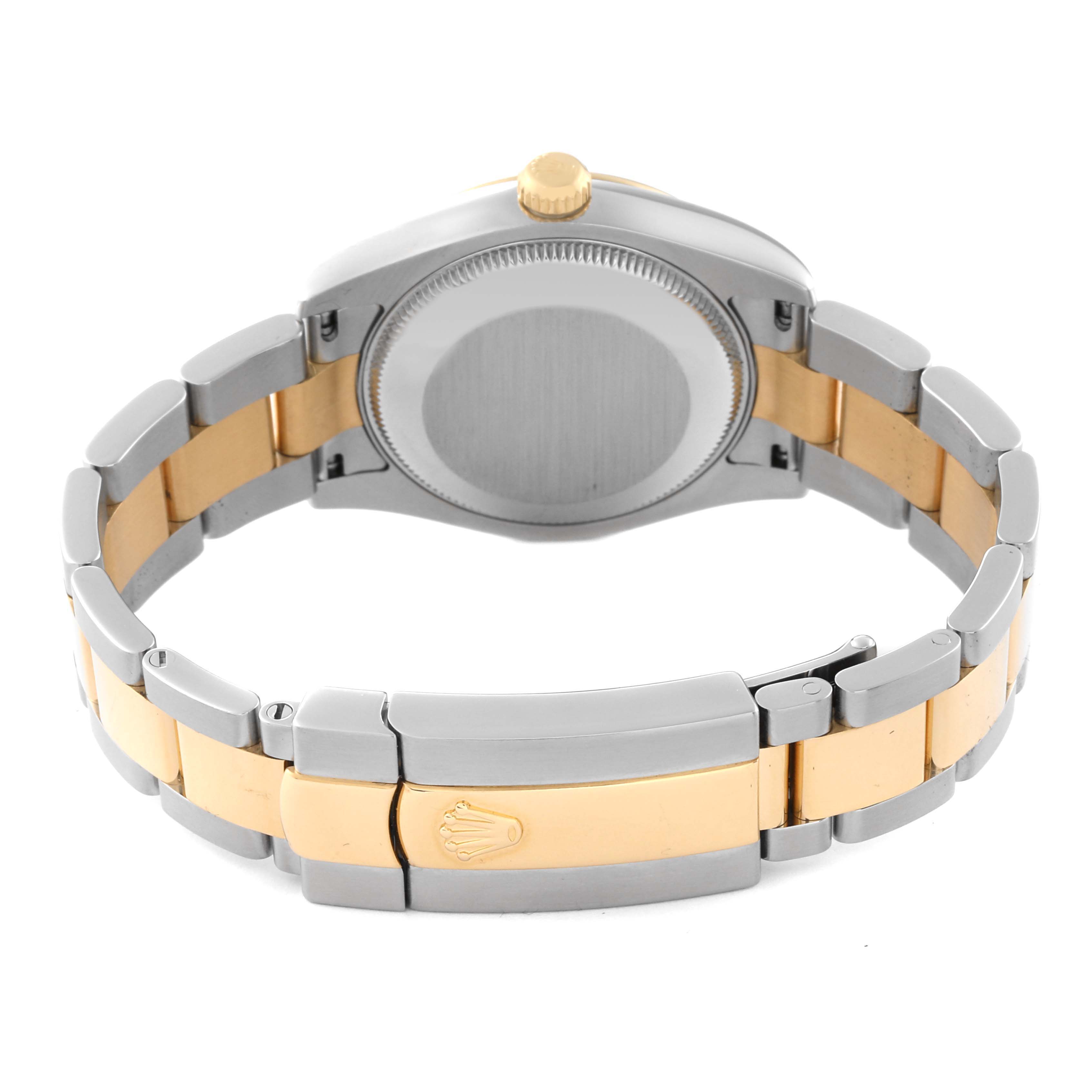 This image shows the backside view of a Rolex Mid-Size 178273 Women's Steel and Gold (two tone) Silver Dial 178273 Women's Steel and Gold (two tone) Silver Dial watch, highlighting its two-tone bracelet and clasp with the Rolex logo.
