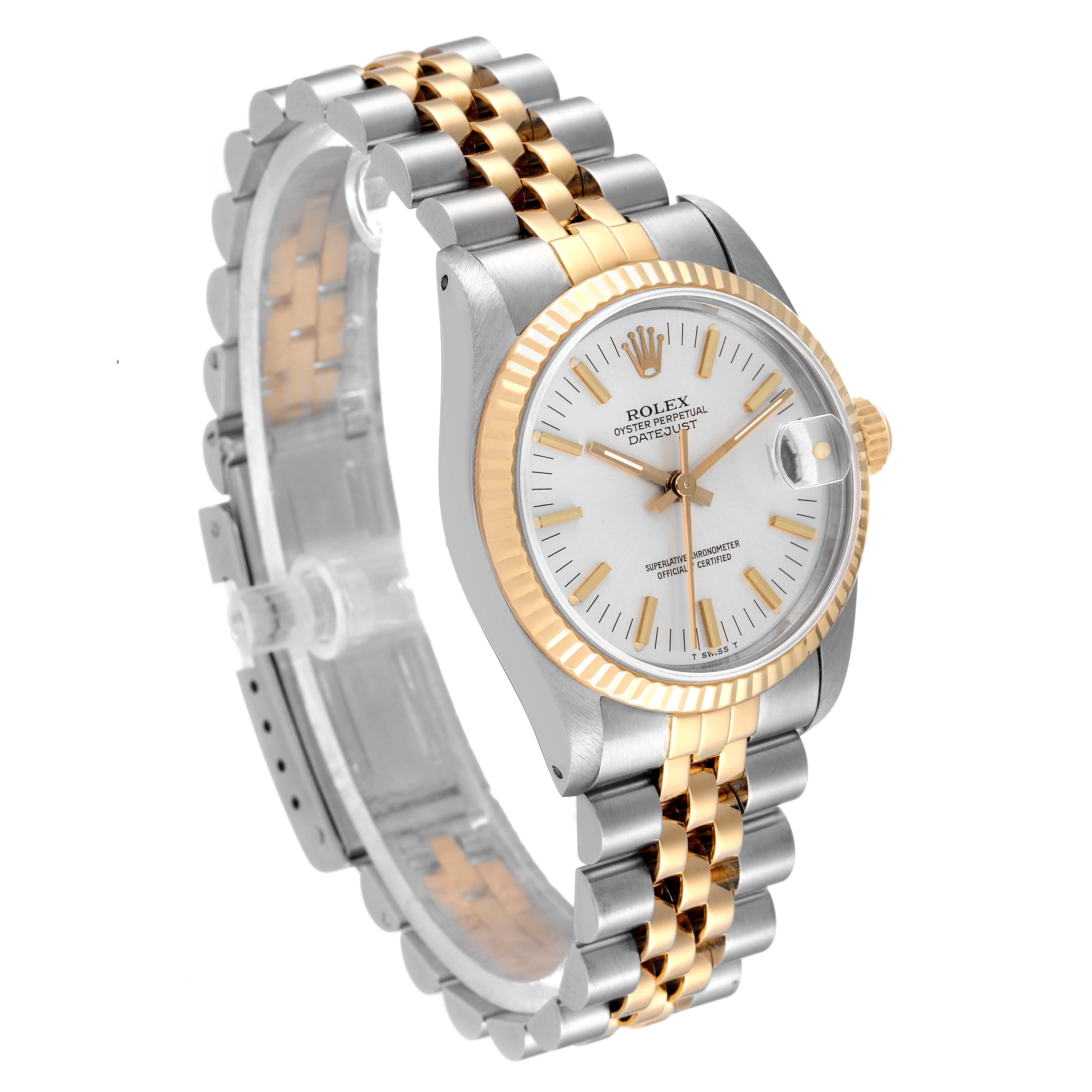 The Rolex Mid-Size 68273 Women
s Steel and Gold (two tone) Silver Dial 68273 Women
s Steel and Gold (two tone) Silver Dial model watch is shown at a three-quarter angle, displaying the face, bezel, and bracelet.
