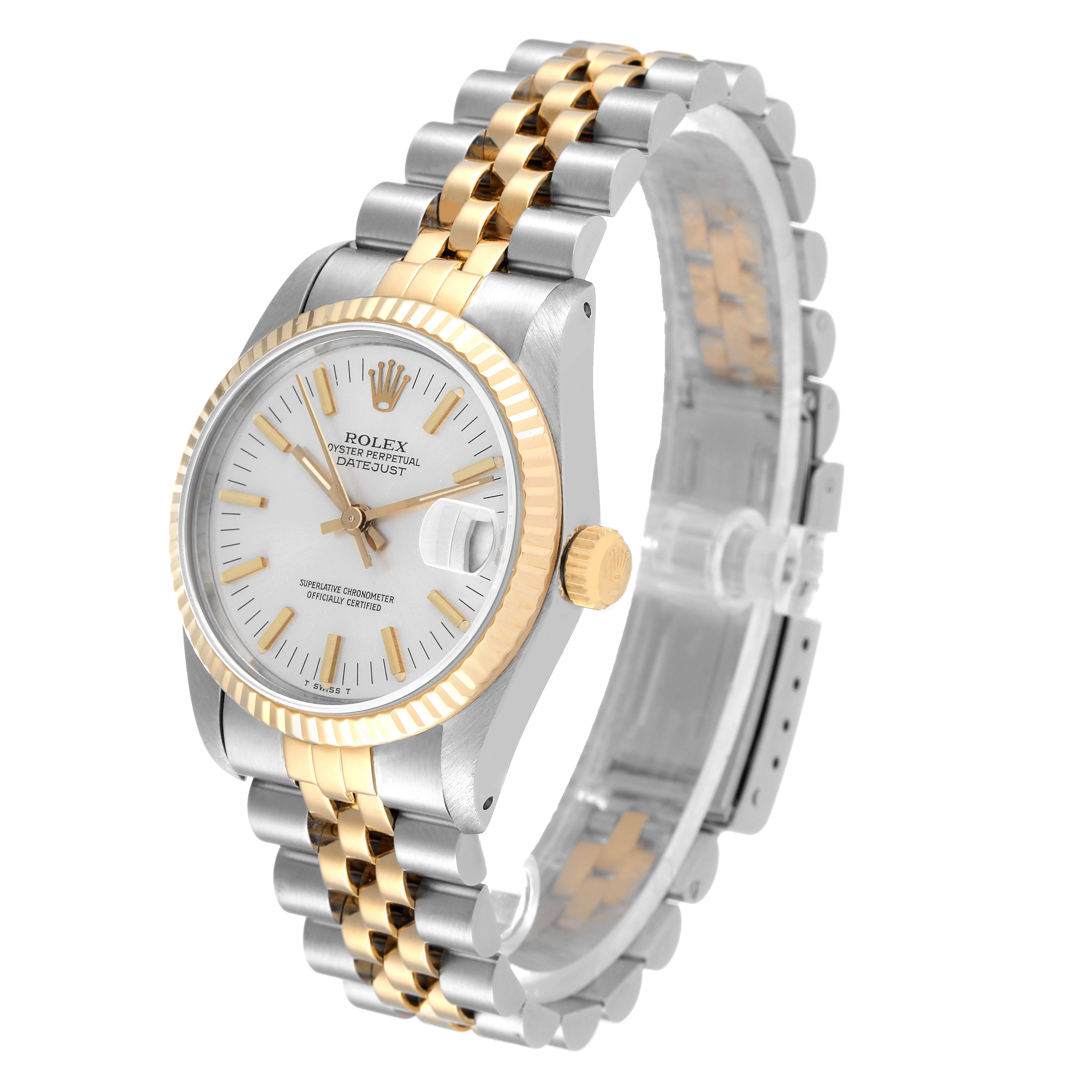 The image shows a Rolex Mid-Size 68273 Women
s Steel and Gold (two tone) Silver Dial 68273 Women
s Steel and Gold (two tone) Silver Dial model watch angled to display its face, bezel, crown, and bracelet.