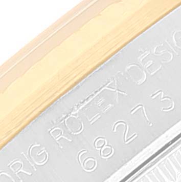 This image shows a close-up of the side engraving of a Mid-Size Rolex watch.