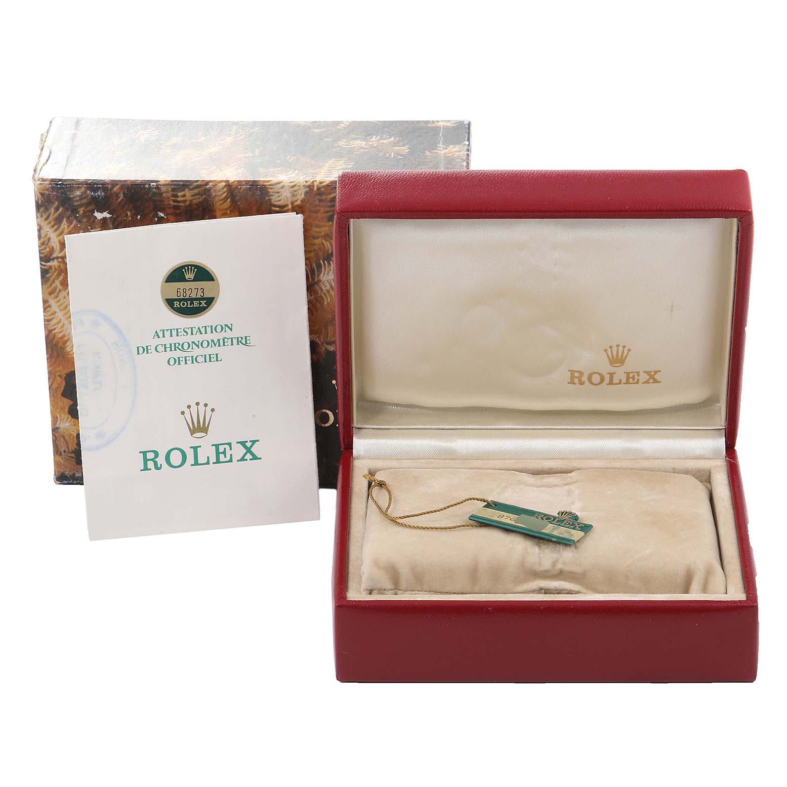 This image shows the Rolex Mid-Size 68273 Women
s Steel and Gold (two tone) Silver Dial 68273 Women
s Steel and Gold (two tone) Silver Dial model
s packaging, including its box, tag, and an official chronometer certification.