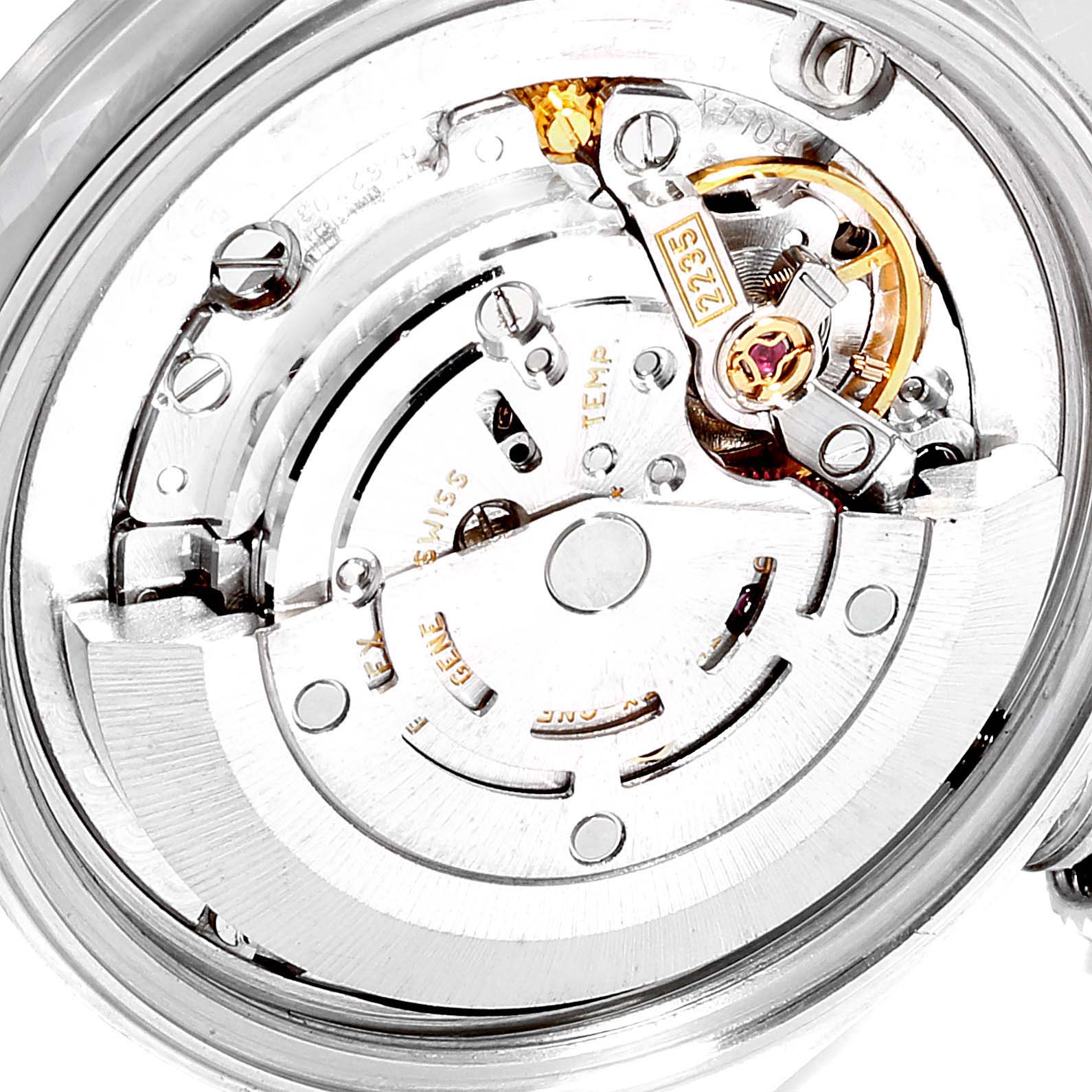 This is an internal view of the movement mechanism of a Rolex Mid-Size 78274 Women
s Stainless Steel Blue Dial 78274 Women
s Stainless Steel Blue Dial watch, showing gears and intricate details.