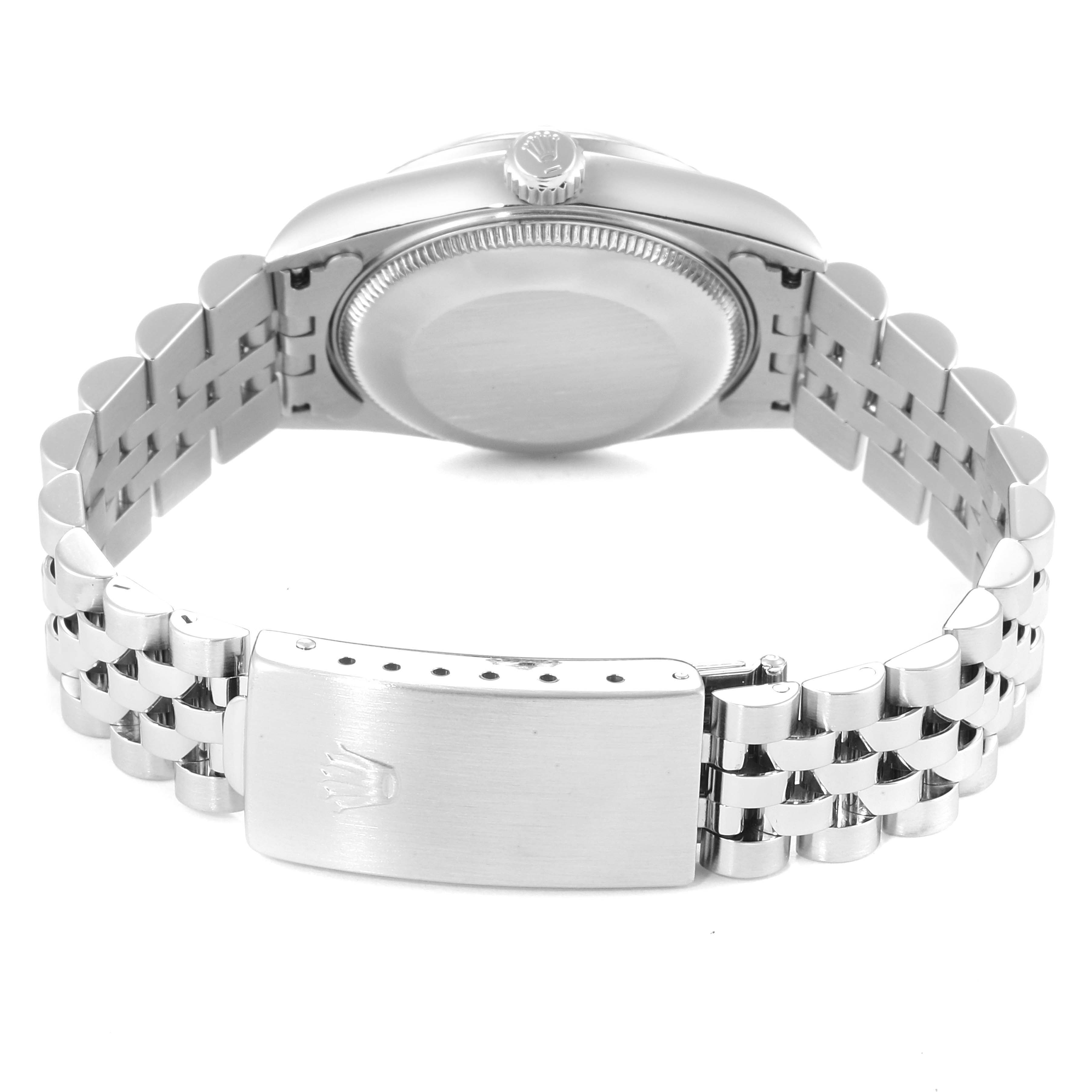 The image shows a Rolex Mid-Size 78274 Women
s Stainless Steel Blue Dial 78274 Women
s Stainless Steel Blue Dial watch from the rear, highlighting the case back and bracelet with a clasp.