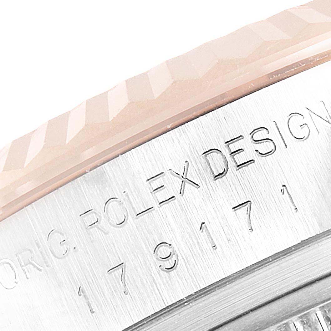 This image shows a close-up angle of the casing and bezel of a Rolex Datejust 179171 Women's Steel and Gold (two tone) Mother of Pearl Dial 179171 Women's Steel and Gold (two tone) Mother of Pearl Dial watch.