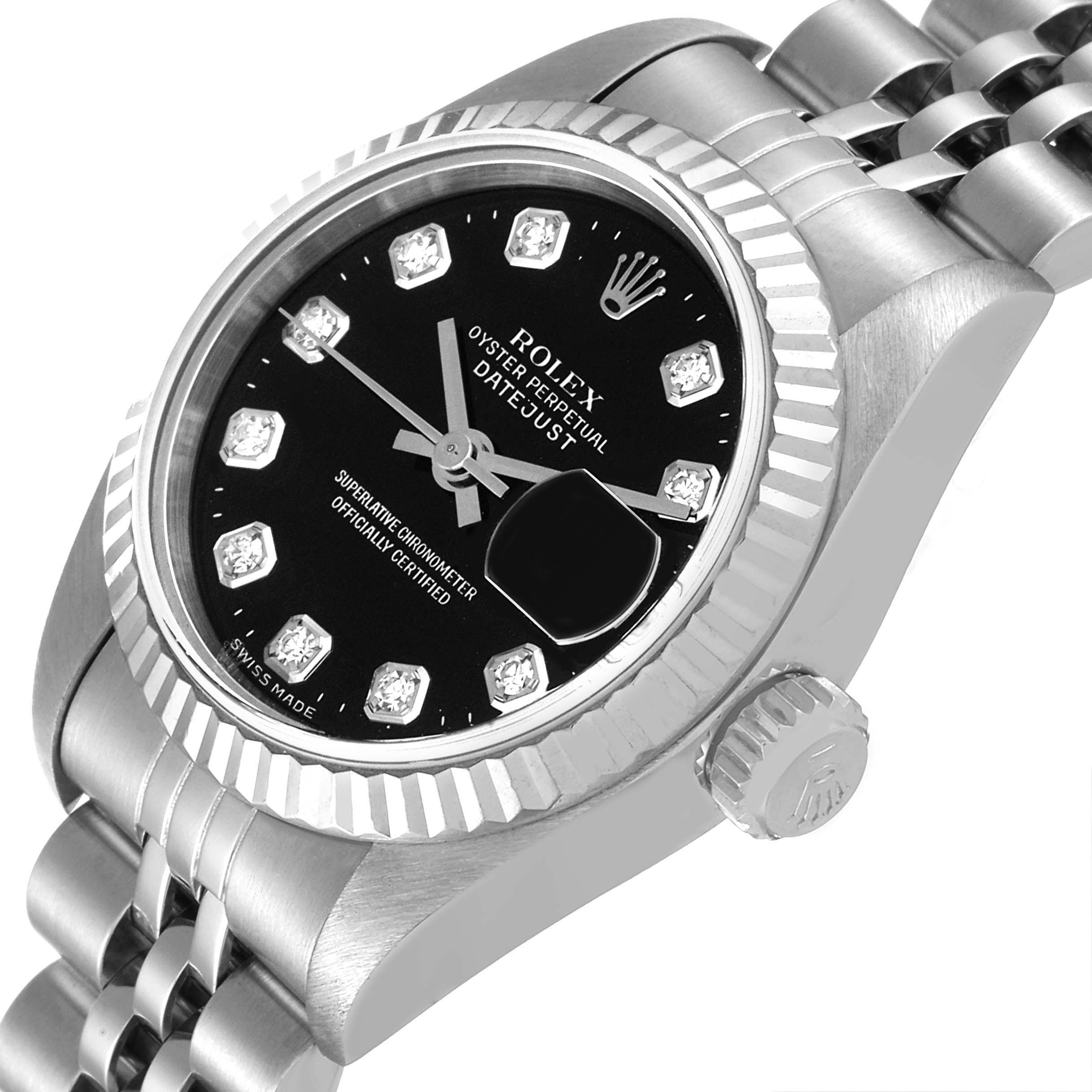 This image shows a close-up, side angle of the Rolex Datejust 79174 Women's Stainless Steel Black Dial 79174 Women's Stainless Steel Black Dial watch, including the case, dial, bezel, crown, and part of the bracelet.