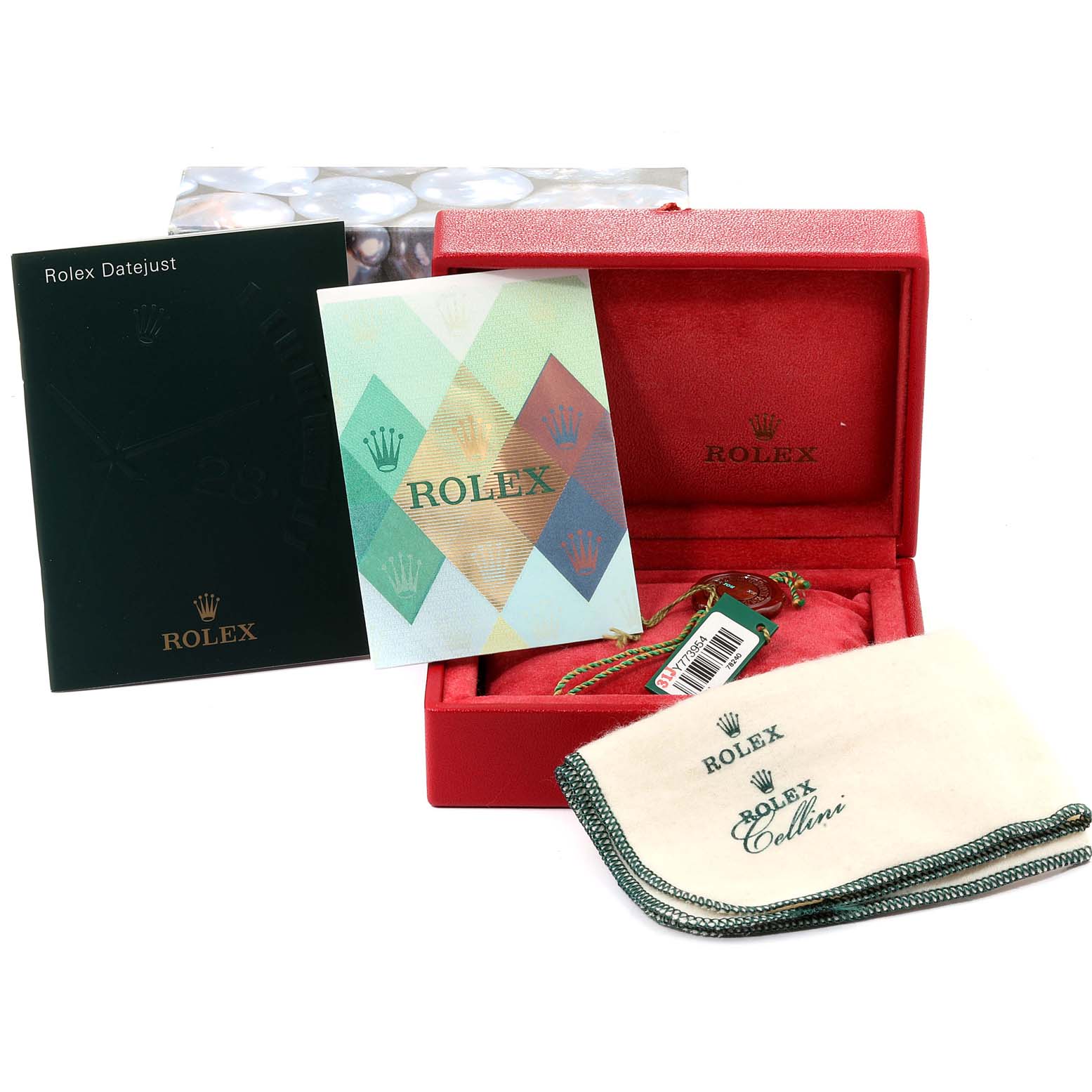 The image shows a Rolex Datejust 79174 Women
s Stainless Steel Silver Dial 79174 Women
s Stainless Steel Silver Dial box, manuals, warranty card, hang tags, and cleaning cloth.