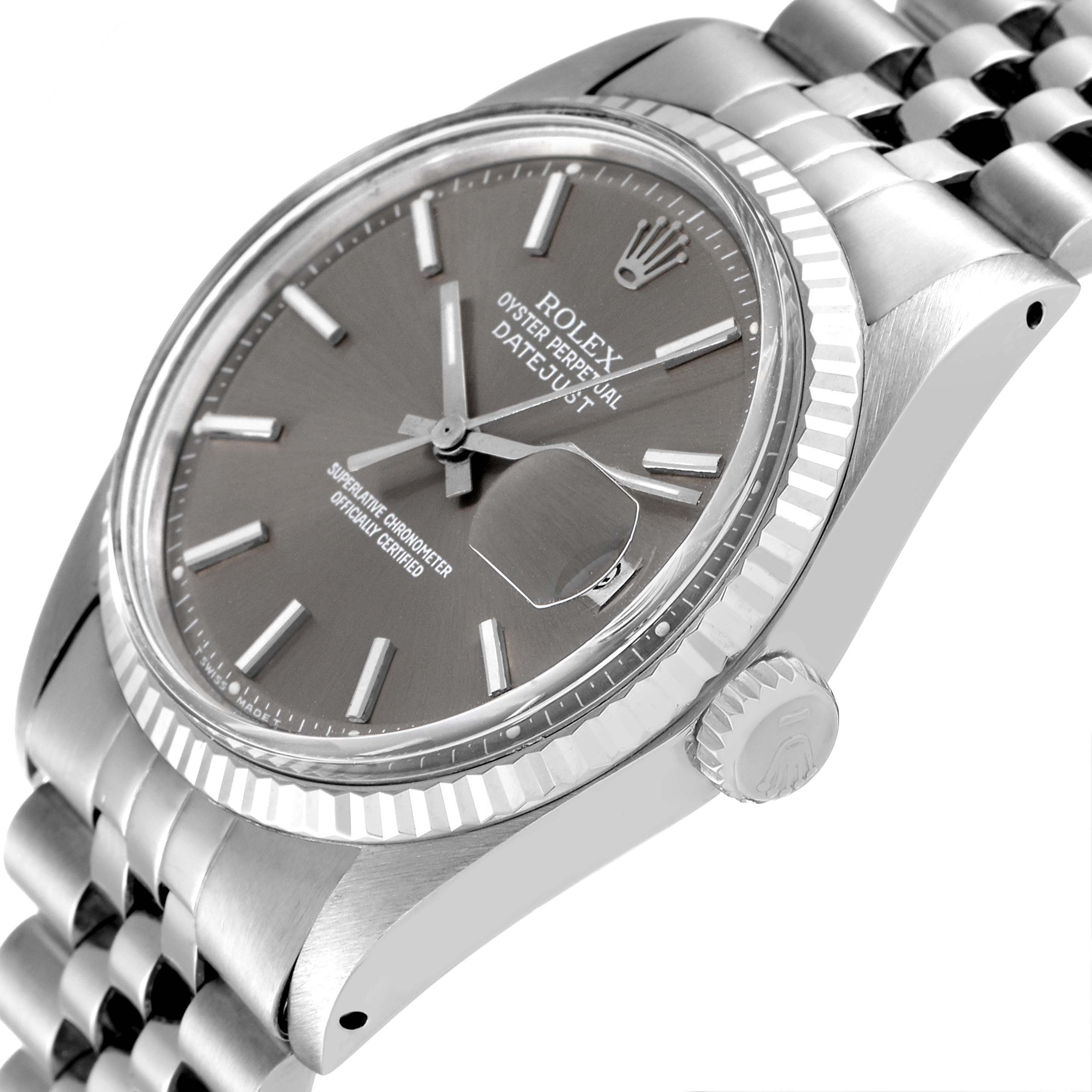 The image shows a close-up angled view of the Rolex Vintage Collection 1601 Men's Stainless Steel Grey Dial 1601 Men's Stainless Steel Grey Dial Datejust watch, highlighting the dial, bezel, crown, and part of the bracelet.