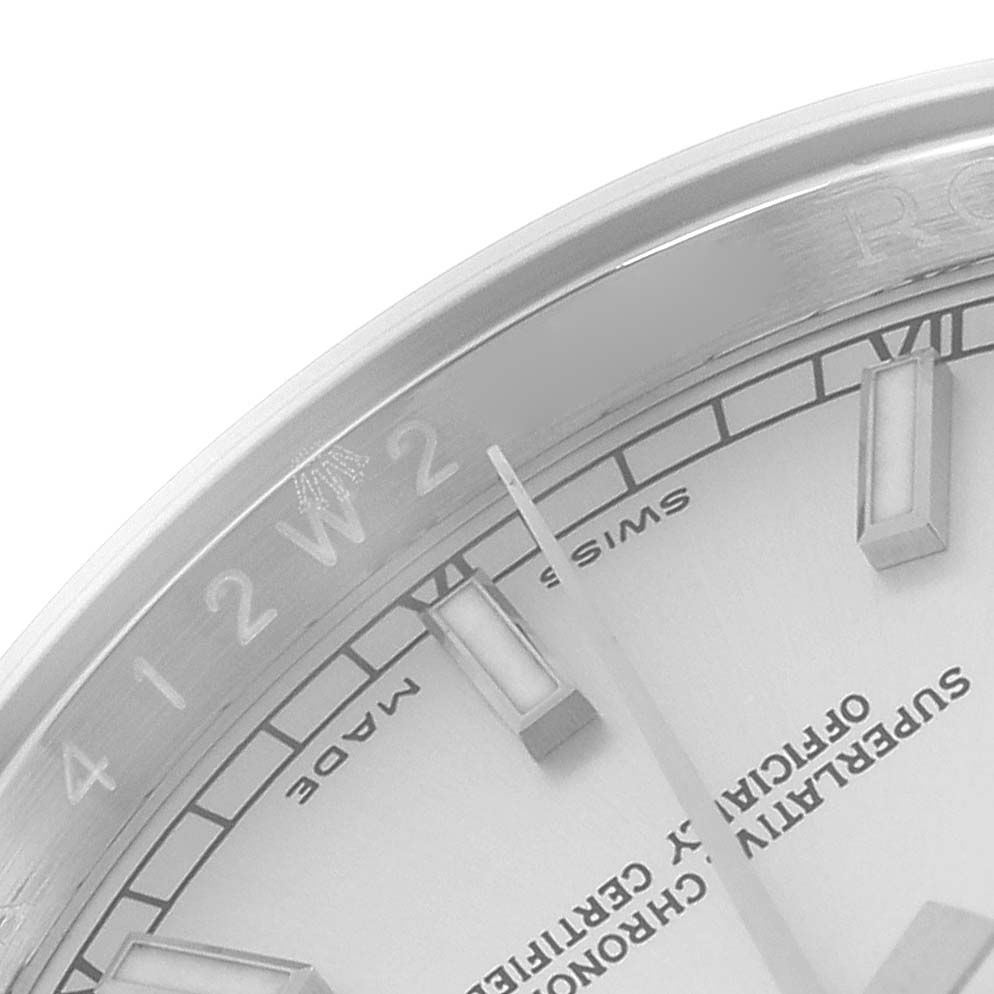 The image shows a close-up of the Rolex Datejust 116234 Men
s Stainless Steel Silver Dial 116234 Men
s Stainless Steel Silver Dial
s dial and bezel, focusing on the indices and physical details.