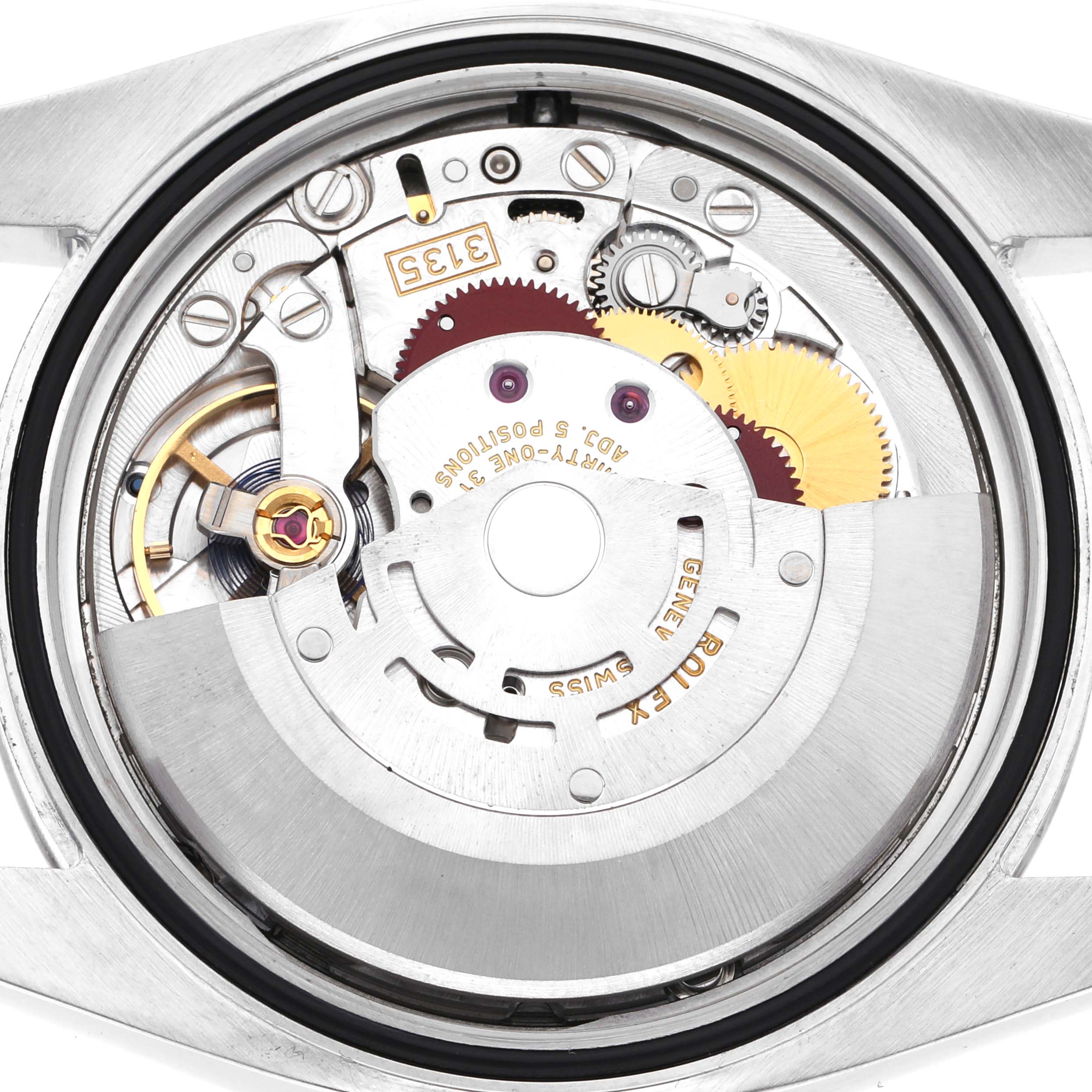 The image shows the inner mechanical movement of a Rolex Datejust 116234 Men
s Stainless Steel Silver Dial 116234 Men
s Stainless Steel Silver Dial, viewed from the back with visible gears and rotor.