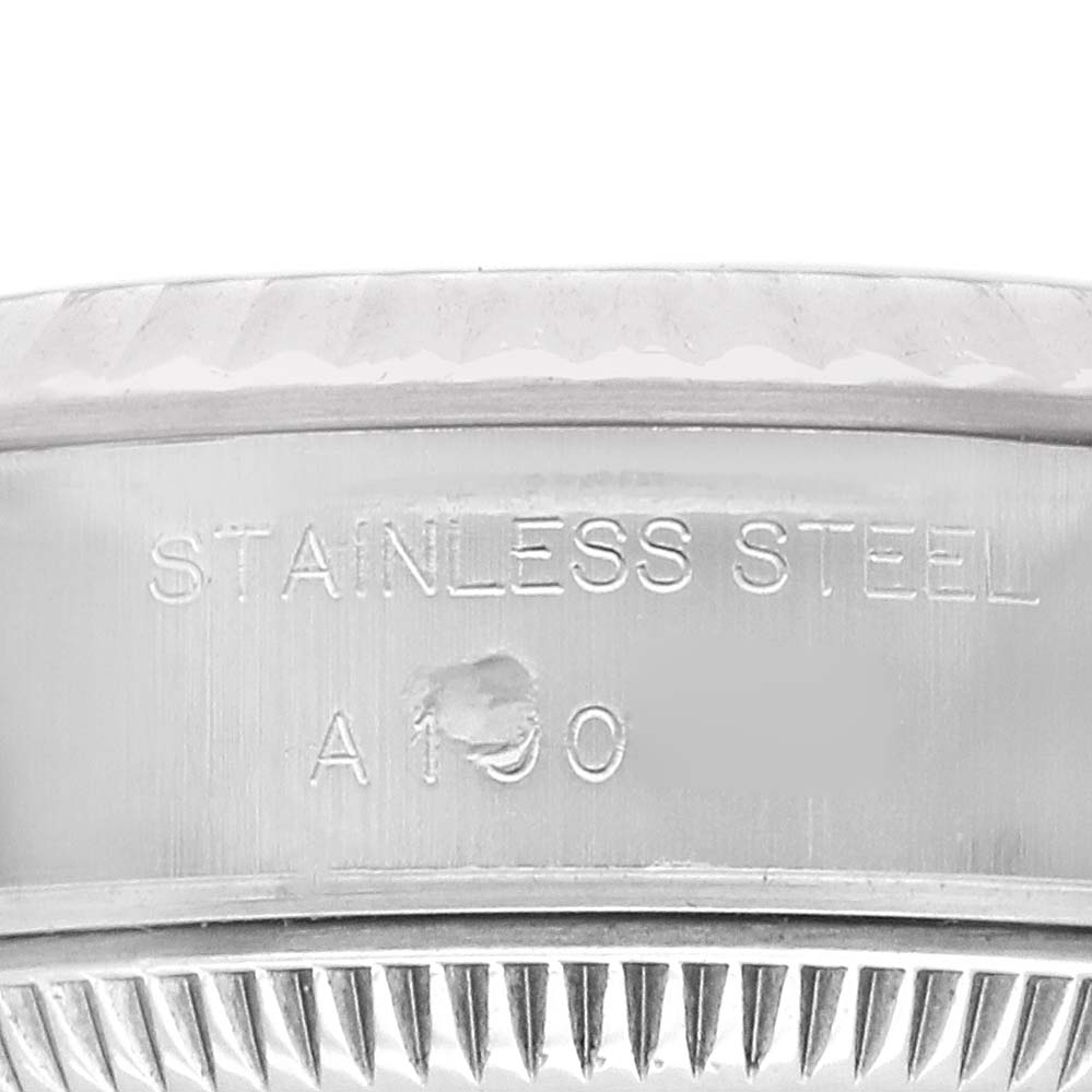 The image shows a close-up side view of the case edge and bezel of a Rolex Datejust 79174 Women
s Stainless Steel White Dial 79174 Women
s Stainless Steel White Dial, highlighting "Stainless Steel" text.