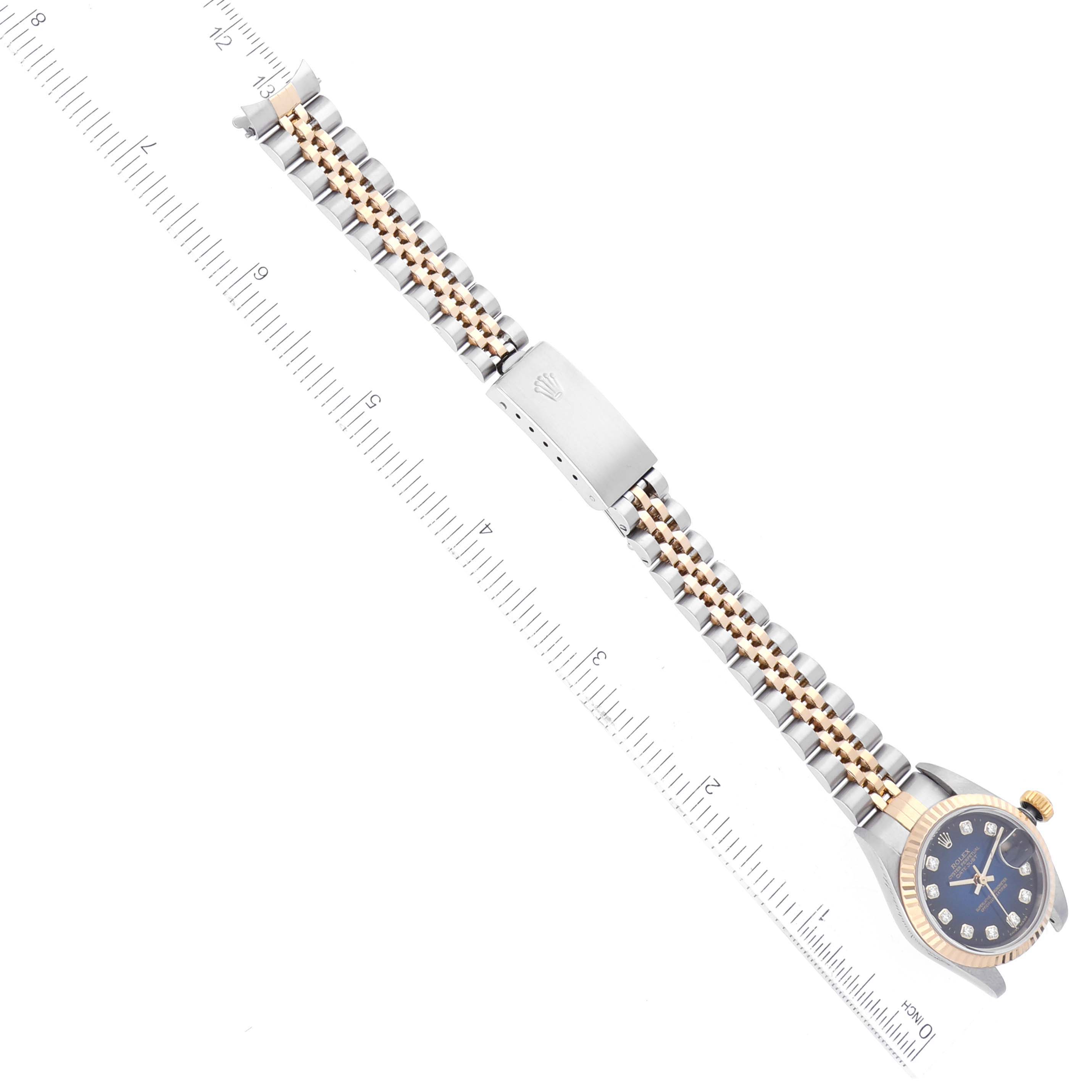 The image shows a Rolex Datejust 79173 Women's Steel and Gold (two tone) Blue Dial 79173 Women's Steel and Gold (two tone) Blue Dial watch at a slight diagonal, highlighting its bracelet and clasp.