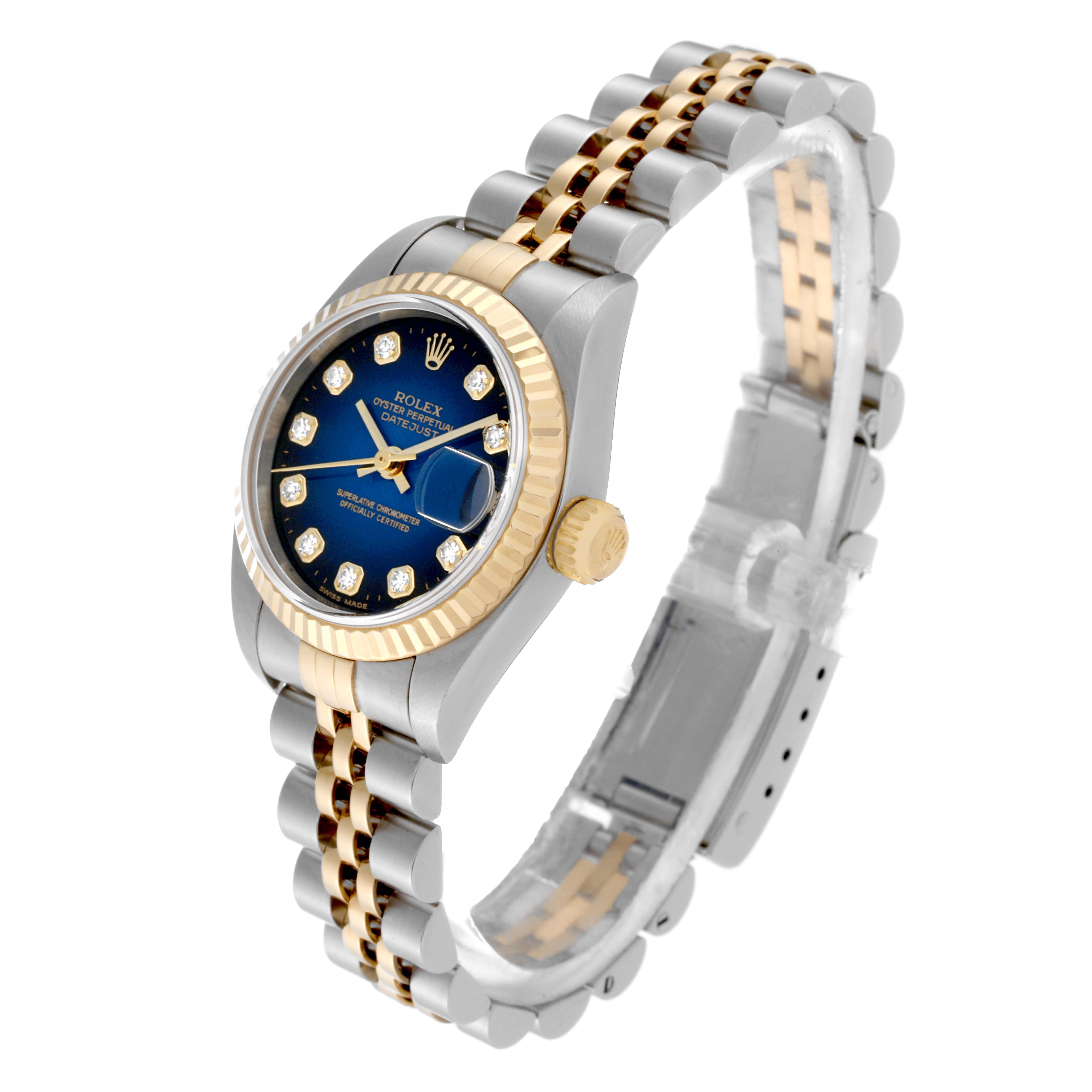 The Rolex Datejust 79173 Women's Steel and Gold (two tone) Blue Dial 79173 Women's Steel and Gold (two tone) Blue Dial watch is shown at a slight angle showcasing its face, bezel, crown, and bracelet.