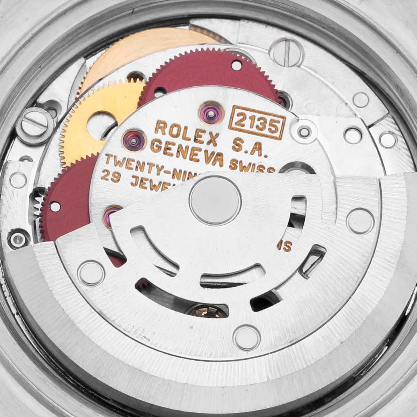 This image shows the internal mechanical movement of a Rolex Datejust 69173 Women's Steel and Gold (two tone) Champagne Dial 69173 Women's Steel and Gold (two tone) Champagne Dial watch, highlighting the intricate gears and components.