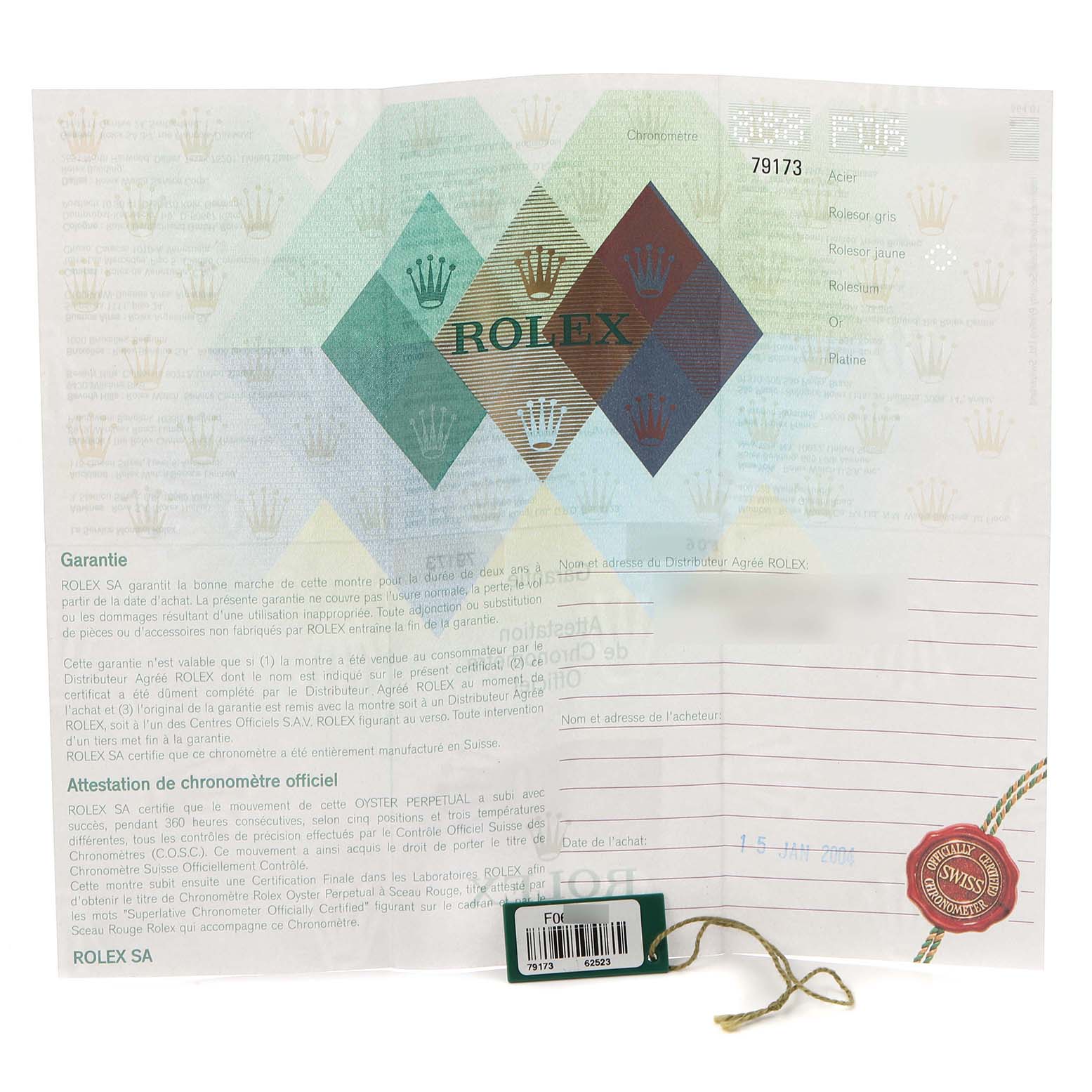 The image shows the warranty certificate and accessories for a Rolex Datejust 79173 Women
s Steel and Gold (two tone) Mother of Pearl Dial 79173 Women
s Steel and Gold (two tone) Mother of Pearl Dial watch, including a tag.