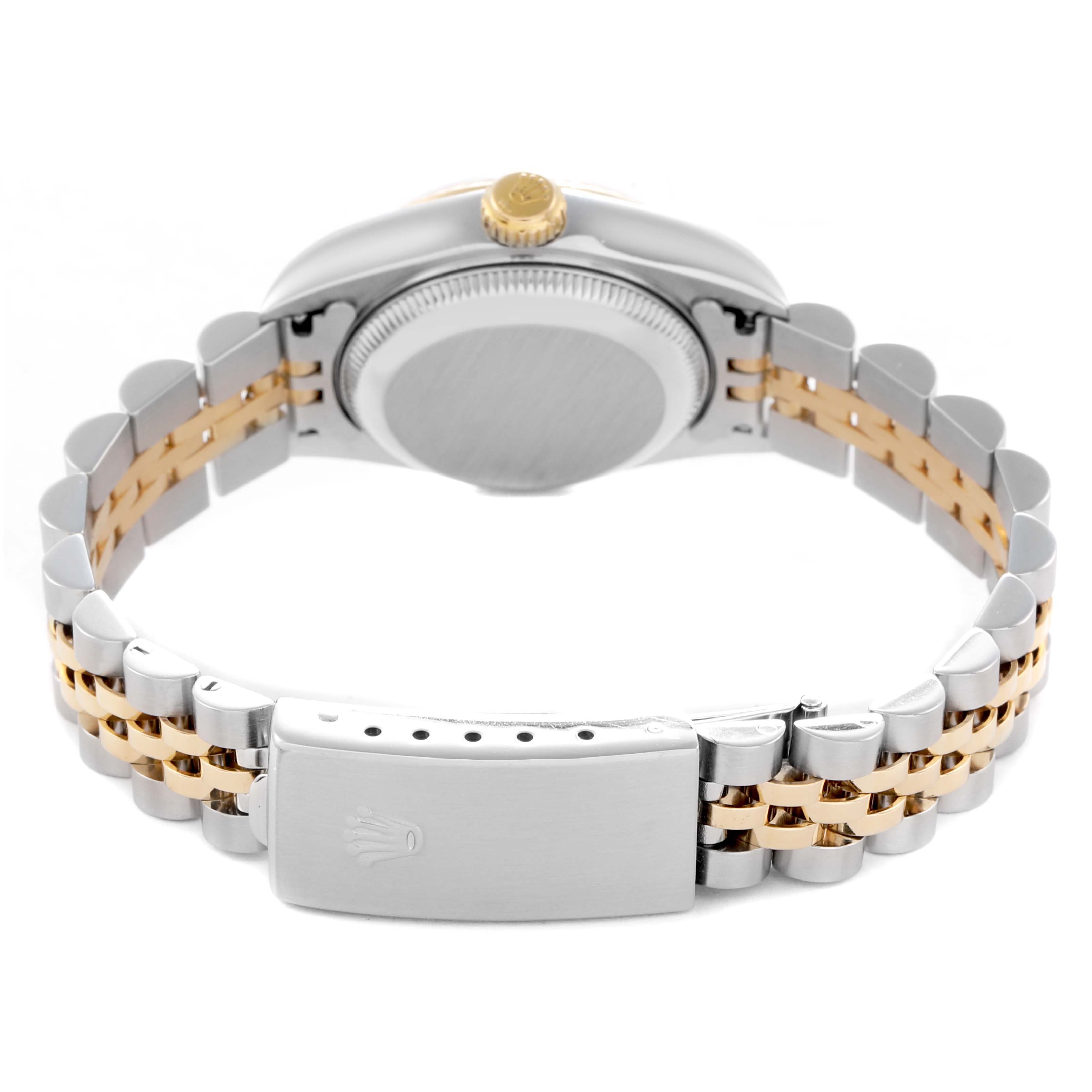 The image shows the back and bracelet of a Rolex Datejust 79173 Women
s Steel and Gold (two tone) Mother of Pearl Dial 79173 Women
s Steel and Gold (two tone) Mother of Pearl Dial watch, highlighting the clasp, crown, and steel and gold links.