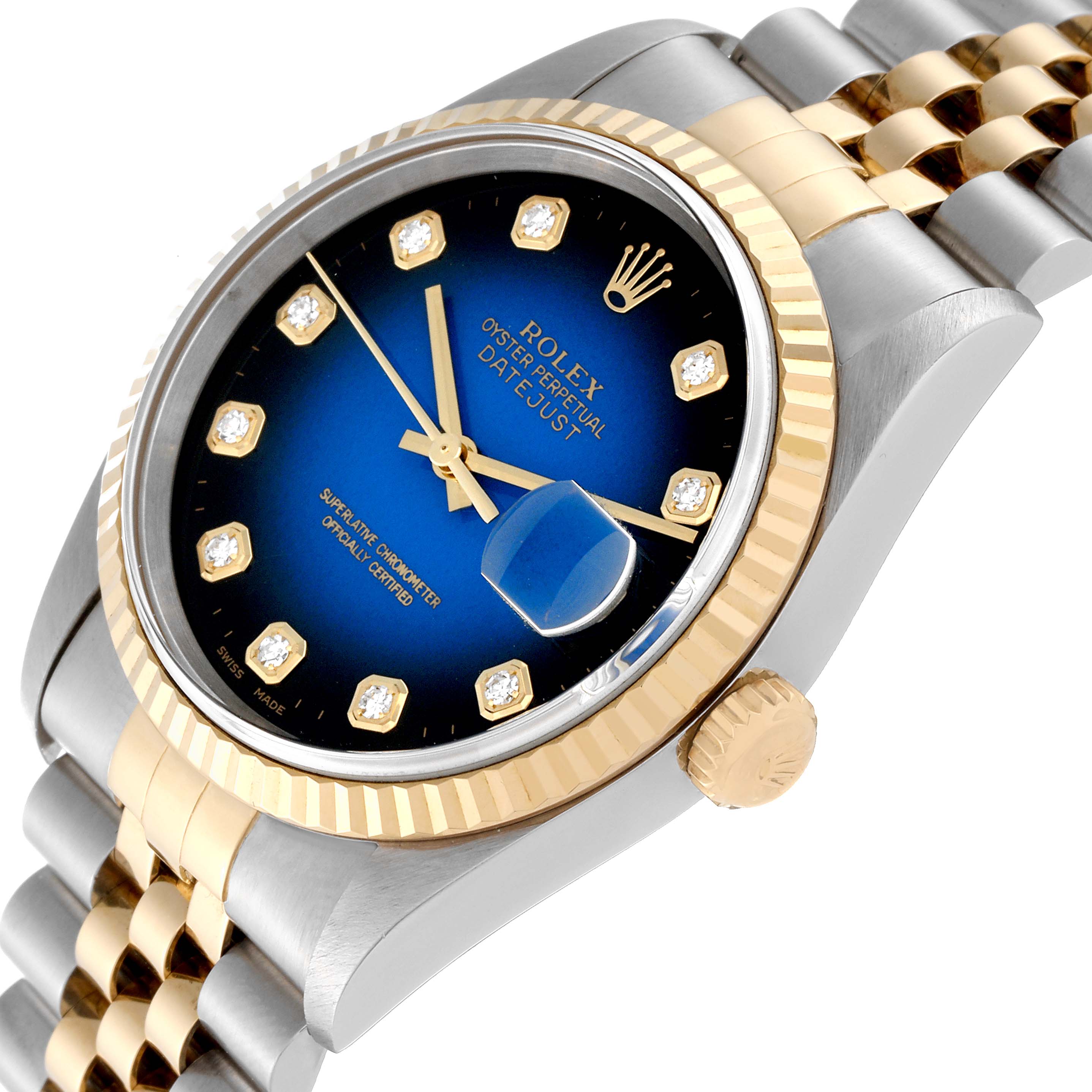 The image shows a close-up view of a Rolex Datejust 16233 Men's Steel and Gold (two tone) Blue Dial 16233 Men's Steel and Gold (two tone) Blue Dial watch, highlighting the blue dial with diamond hour markers, gold fluted bezel, crown, and part of the two-tone bracelet.