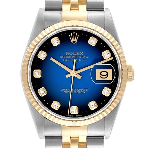 This image shows a front view of the Rolex Datejust watch, featuring a gold fluted bezel, blue dial, diamond hour markers, and two-tone bracelet.