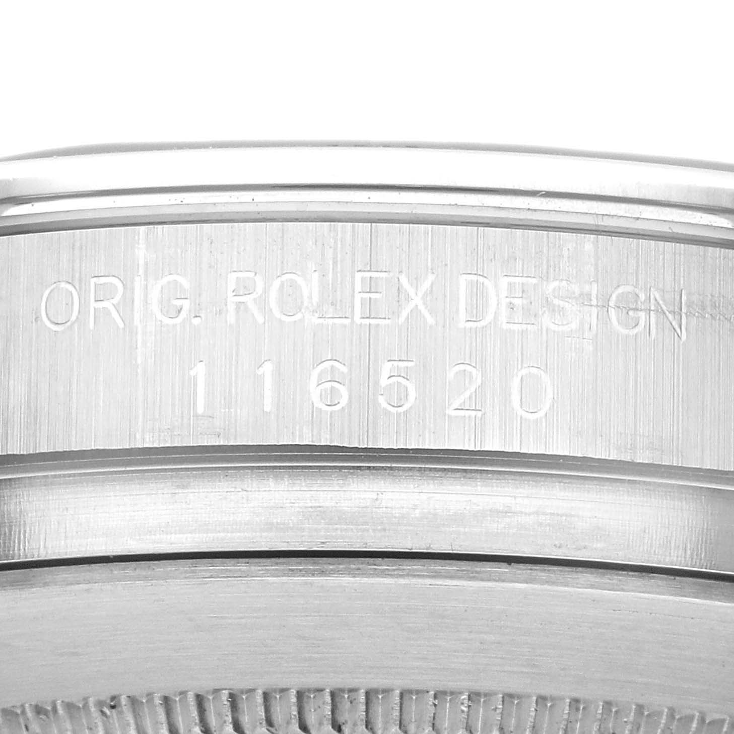 This close-up image shows the side engraving of the case on a Rolex Daytona 116520 Men's Stainless Steel Black Dial 116520 Men's Stainless Steel Black Dial watch, including the model number 116520.