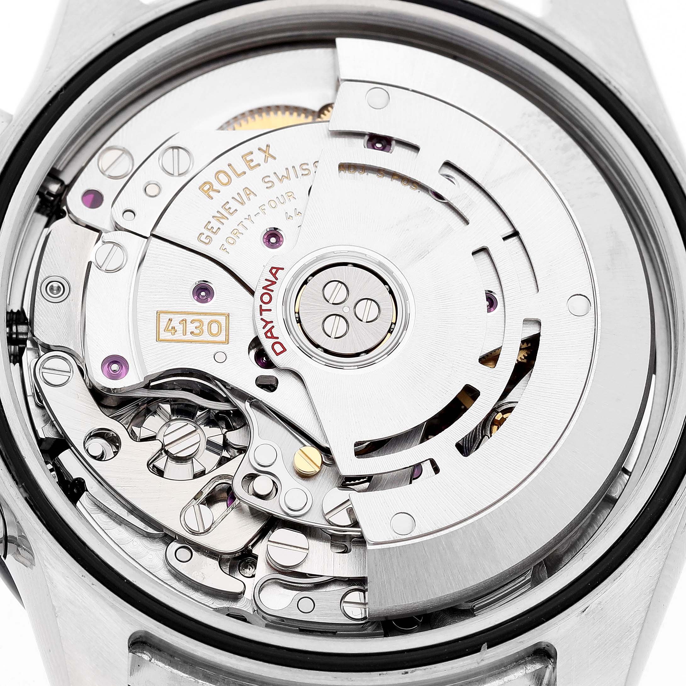 The image shows the back view of the Rolex Daytona 116500LN Men's Stainless Steel Black Dial, highlighting its intricate movement and inner mechanical components.