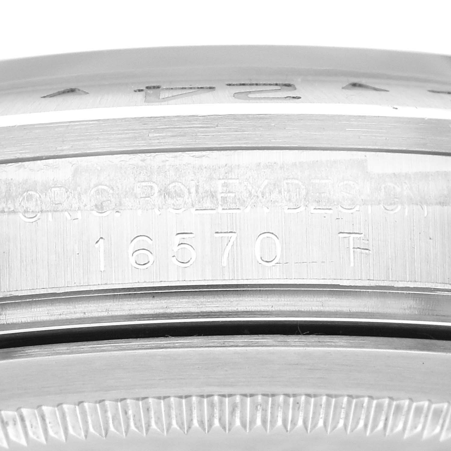 The image shows a close-up of the side engraving featuring the model number "16570" on a Rolex Explorer 16570 Men
s Stainless Steel Black Dial 16570 Men
s Stainless Steel Black Dial watch.