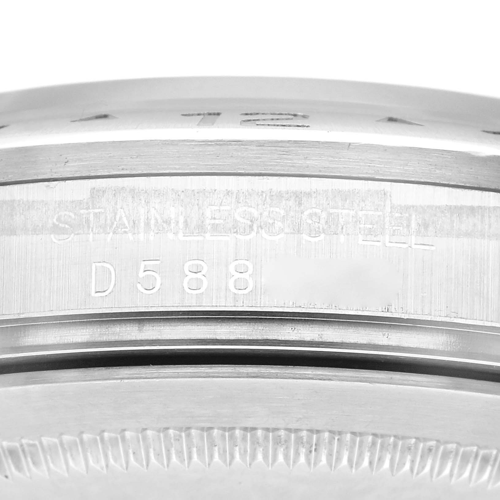 The image shows a close-up of the case back and side engraving of a Rolex Explorer 16570 Men
s Stainless Steel Black Dial 16570 Men
s Stainless Steel Black Dial model.